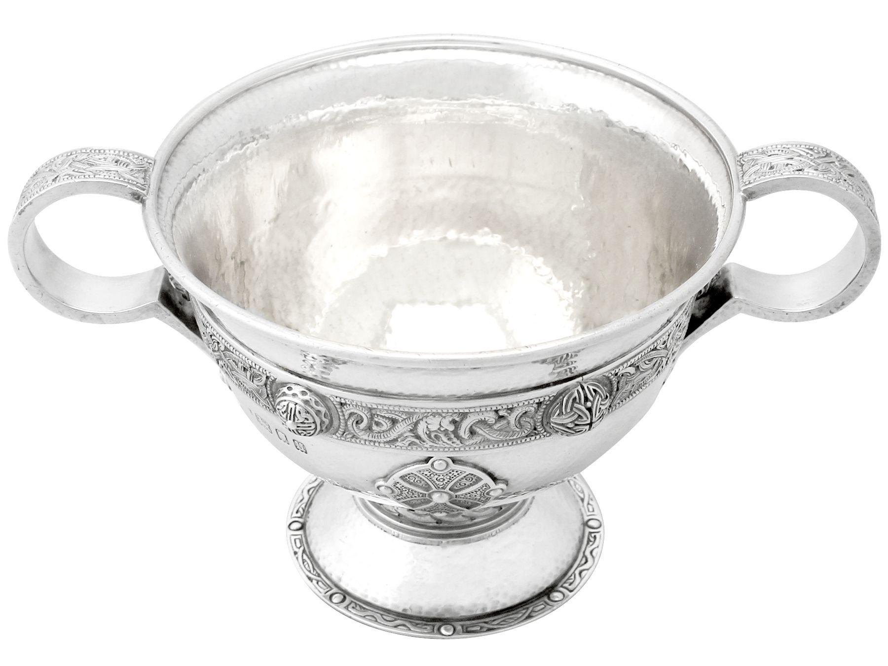 An exceptional, fine and impressive, antique George V English sterling silver bon bon/sugar bowl made by Asprey & Co Ltd in the Lindisfarne style; part of our ornamental silverware collection.

This exceptional antique George V sterling silver