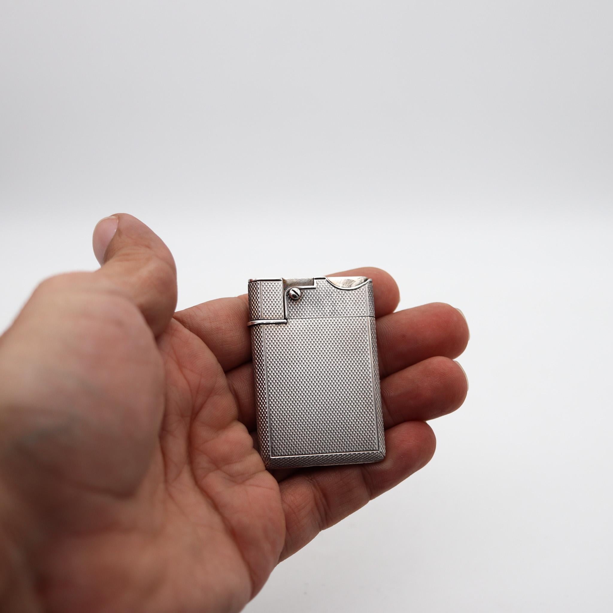 Asprey & Co. London Guilloche Wafer Petrol Lighter In Solid .925 Sterling Silver In Excellent Condition For Sale In Miami, FL