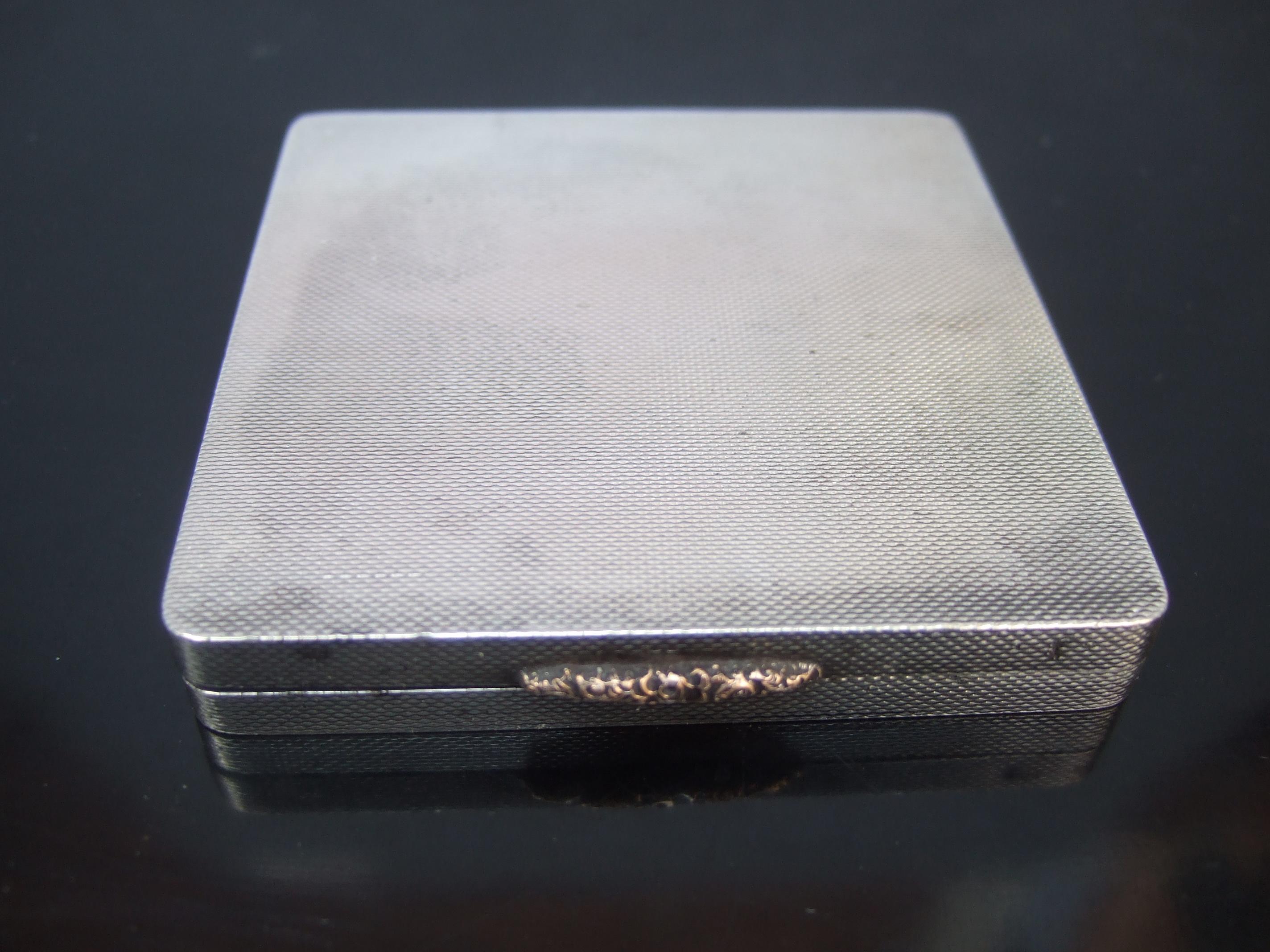 Asprey London Sterling silver opulent art deco vanity compact c 1920s
The elegant vintage compact is designed with sterling silver 
The sterling panels have a very subtle intricate geometric design 

The interior is designed with a matching sterling
