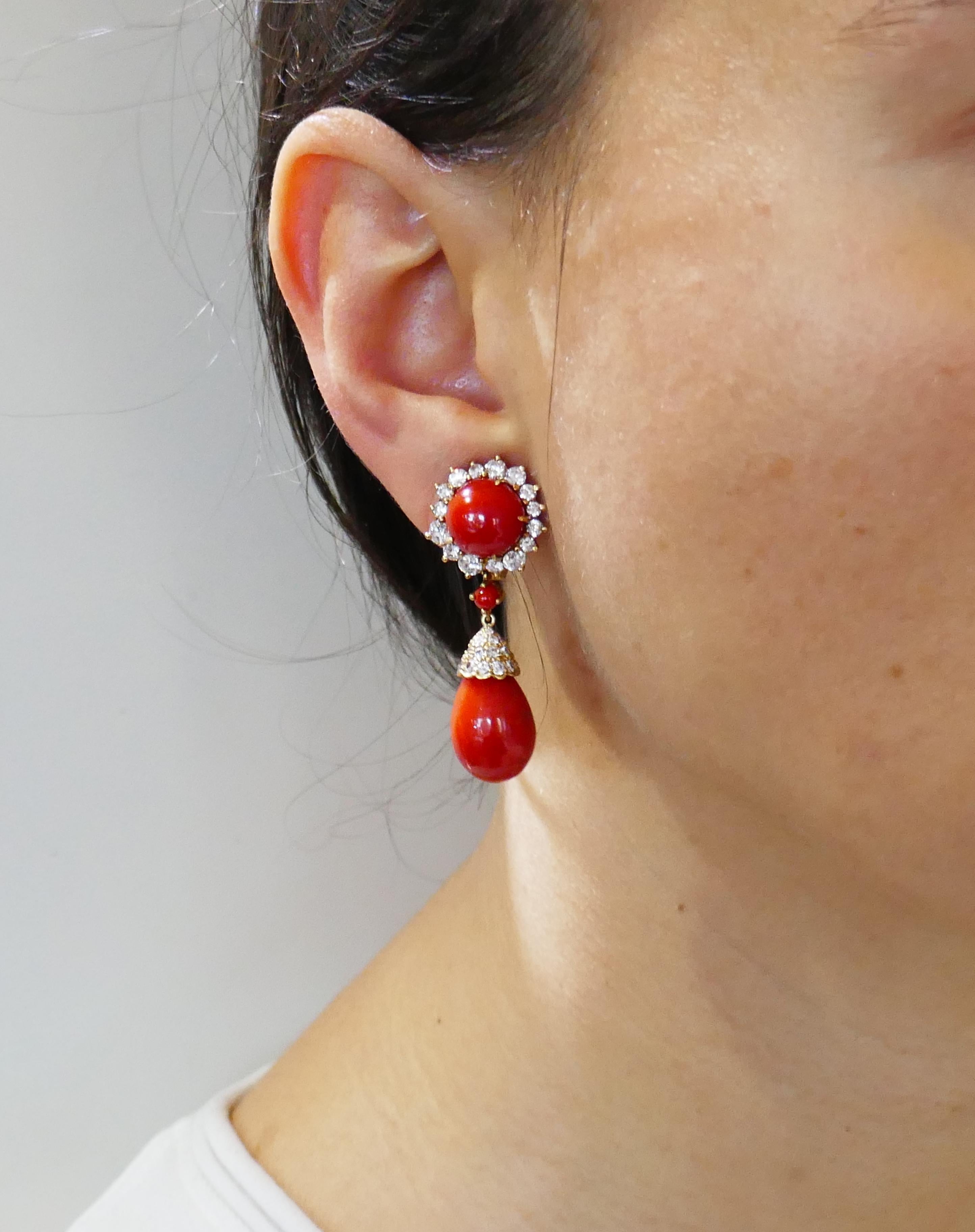 Beautiful dangle earrings created by Asprey in the 1980s. Feminine, stylish and wearable, the earrings are a great addition to your jewelry collection. 
Made of 18 karat yellow gold, the earrings feature gorgeous deep red color Mediterranean coral