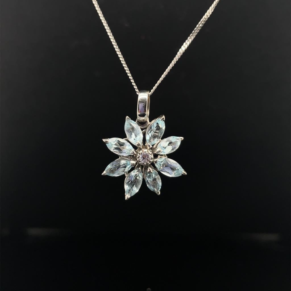 An Asprey daisy aquamarine and diamond pendant in 18 karat white gold, circa 1990.

Flora and fauna have frequently made appearances in Asprey’s collections, and the quintessentially English Daisy has been a longstanding motif that their designers
