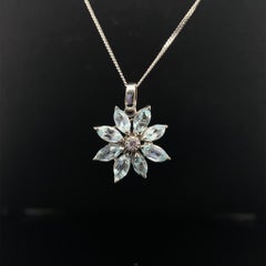 Ciondolo Asprey Daisy con acquamarina e diamanti in oro bianco 18 carati, circa 1990