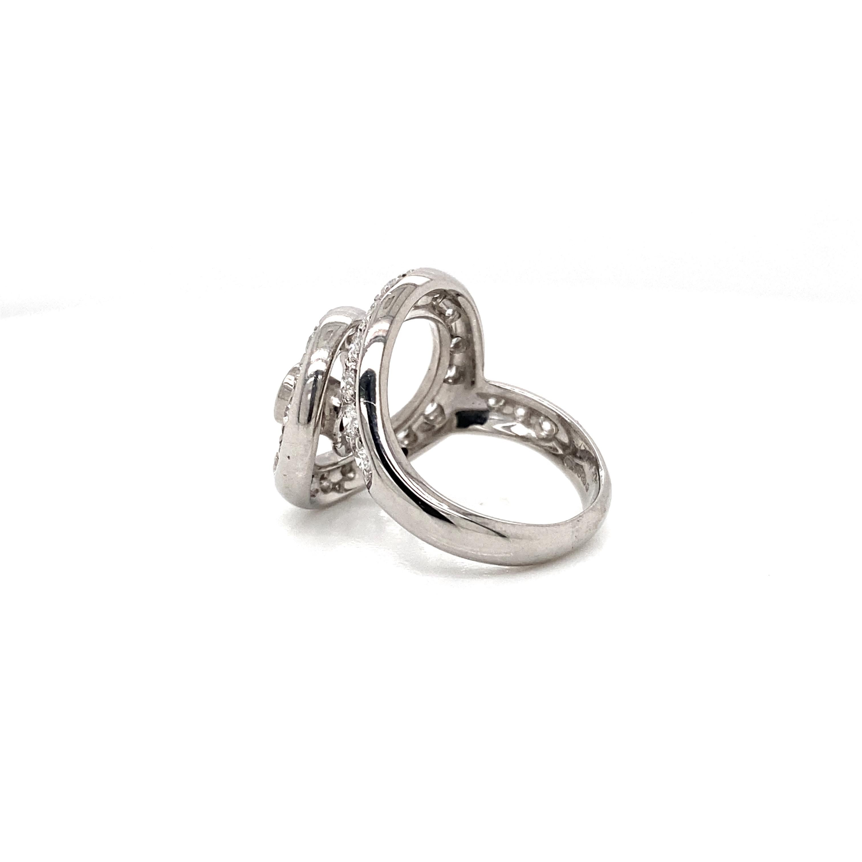Asprey Diamond and 18 Carat White Gold Open Work Swirl Cocktail Ring In Excellent Condition For Sale In London, GB