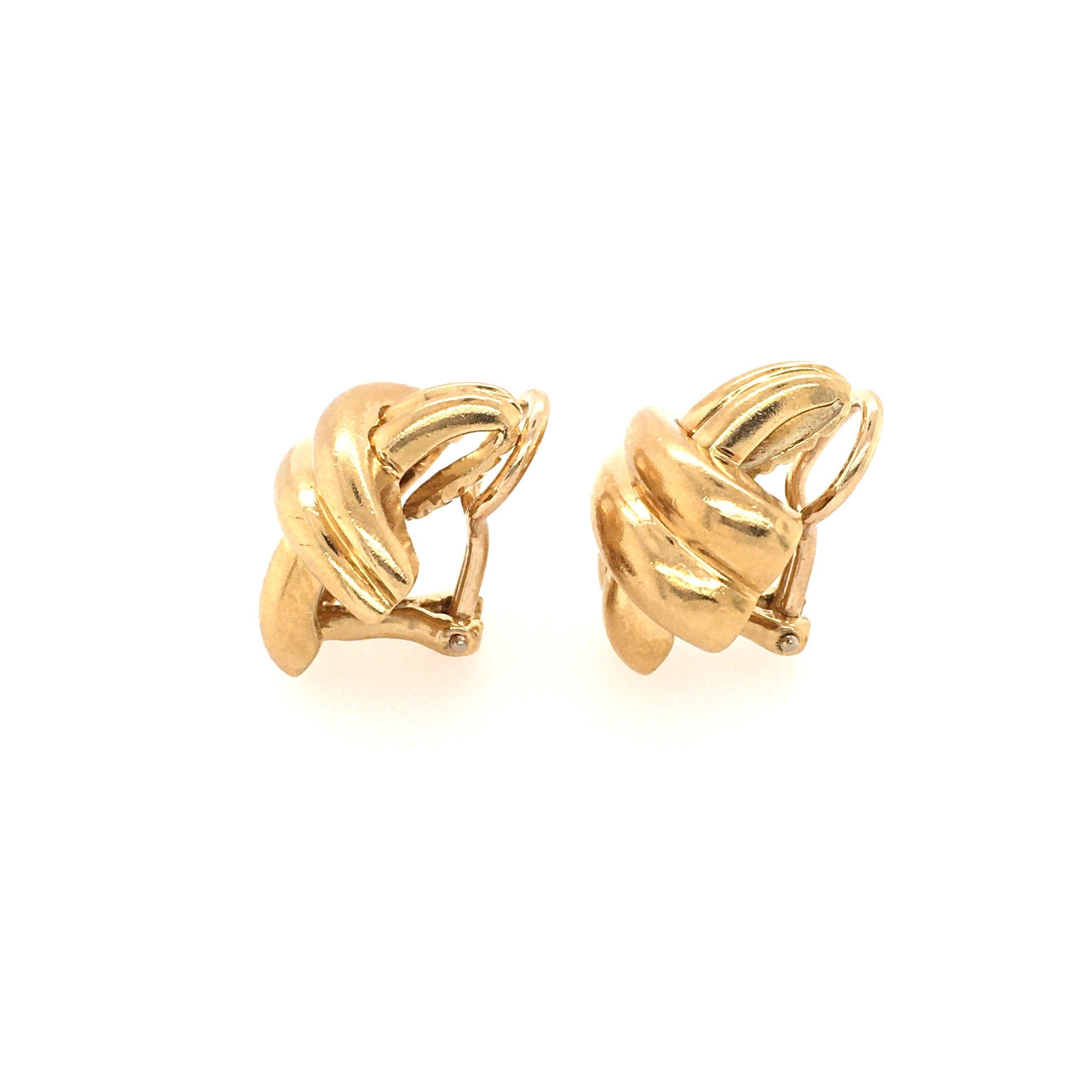 A pair of 18 karat yellow gold earrings. Asprey. Designed as a fluted gold X. Length is approximately3/4 inches, gross weight is approximately 13.4 grams. Stamped Asprey, 18K. 