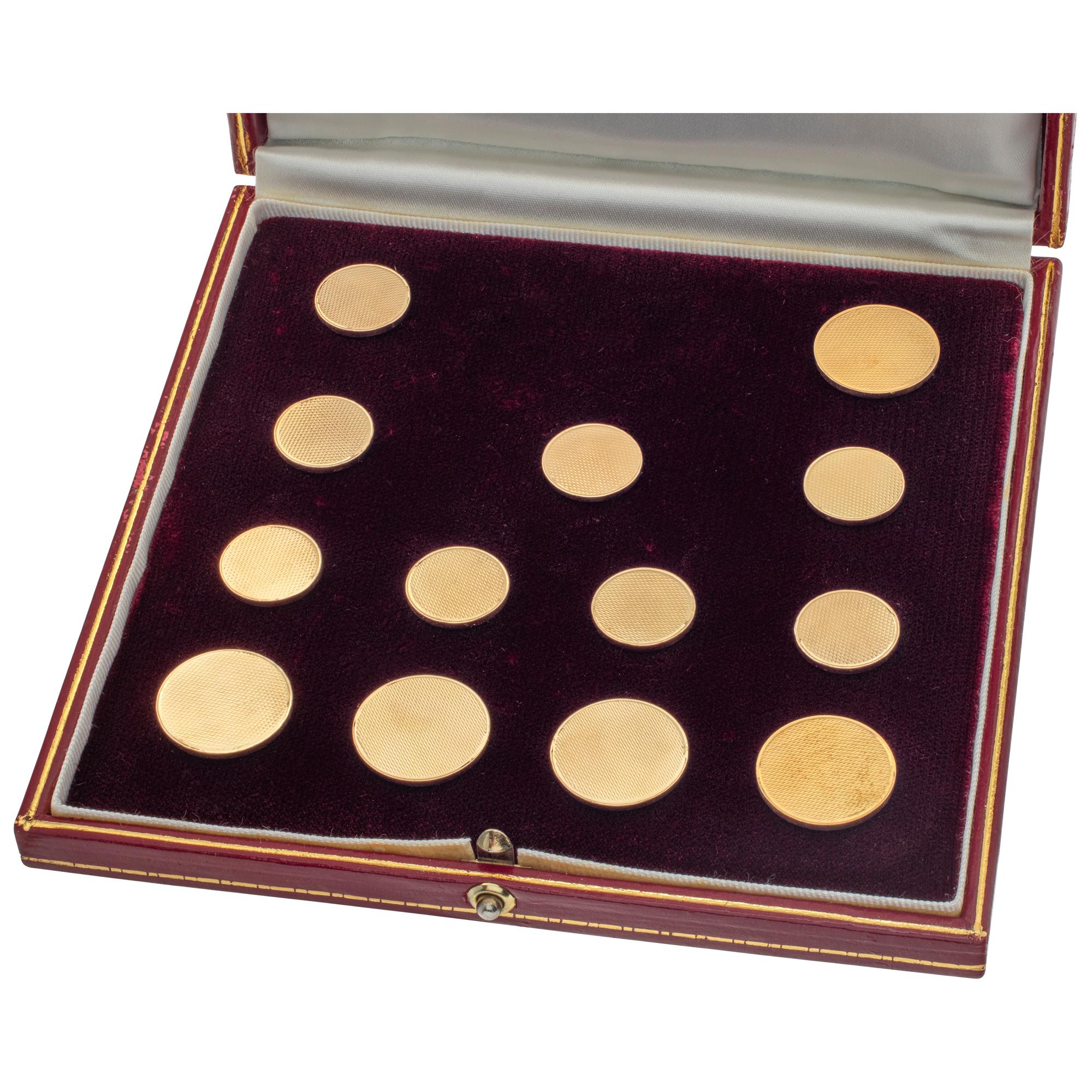 Asprey London 18k yellow gold blazer buttons (13 total count). Kick your jacket up to Regal! Comes with eight 15mm cufflink buttons in 18k yellow gold (four for each cuff), and five 20mm buttons for center jacket in 18k yellow gold. Complete with