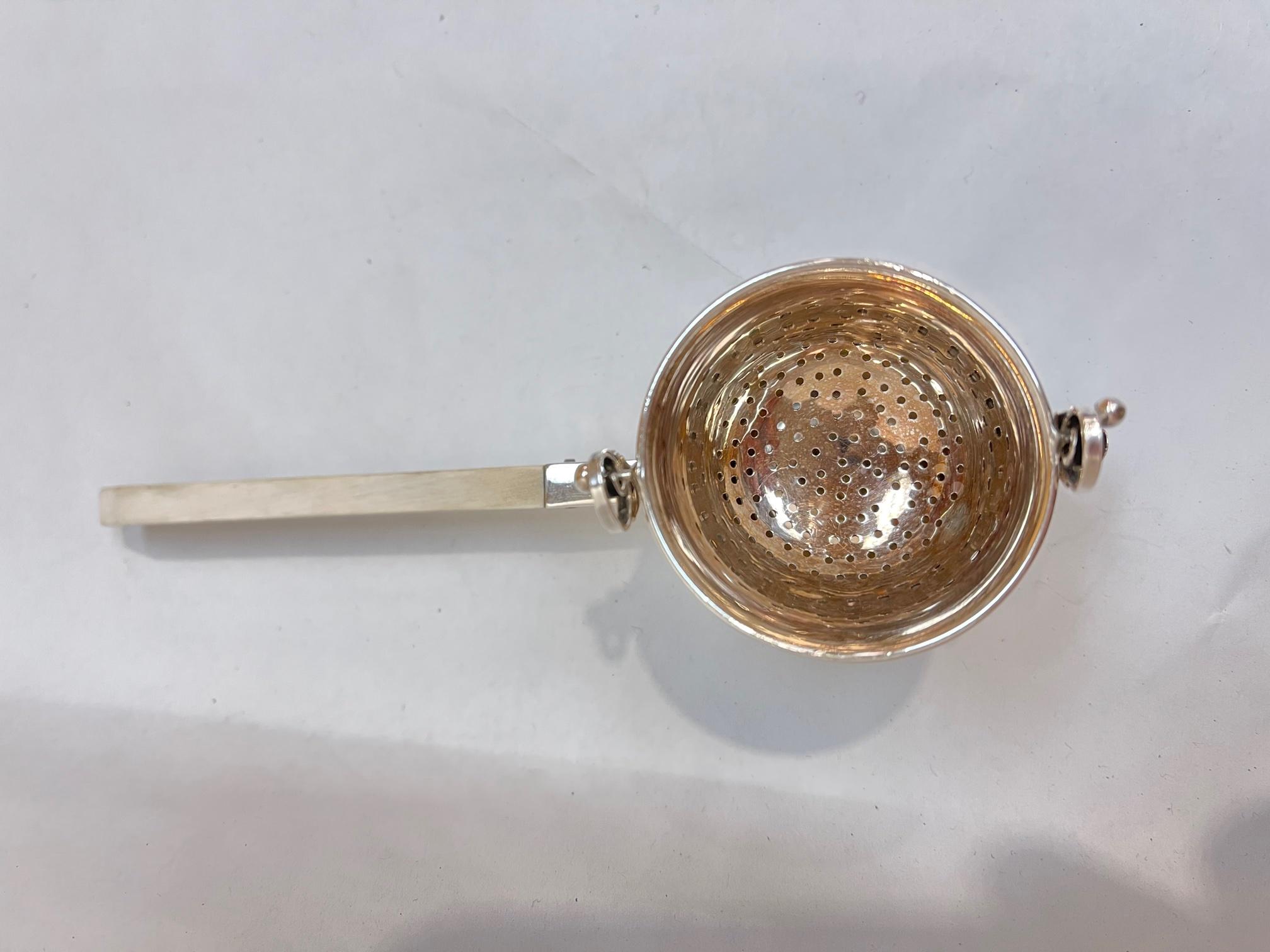 silver tea strainer with drip bowl