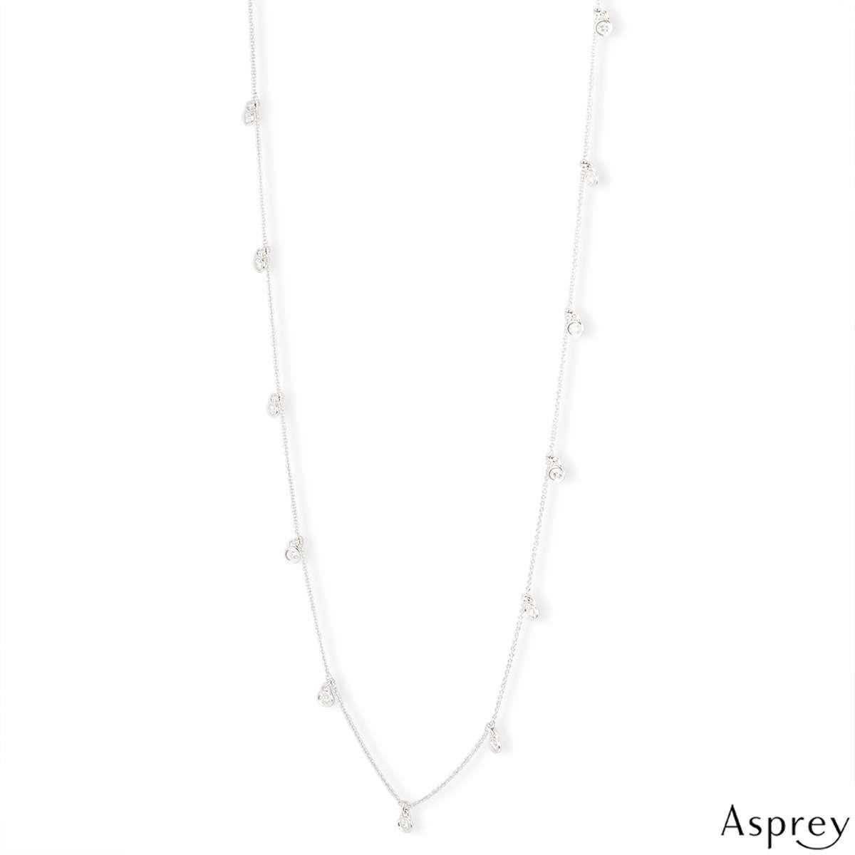 A beautiful 18k white gold necklace by Asprey. The necklace features 13 round brilliant cut diamonds in a rubover setting, spread throughout the chain. The diamonds have a total weight of 2.05ct. The necklace measures 36 inches in length and has a