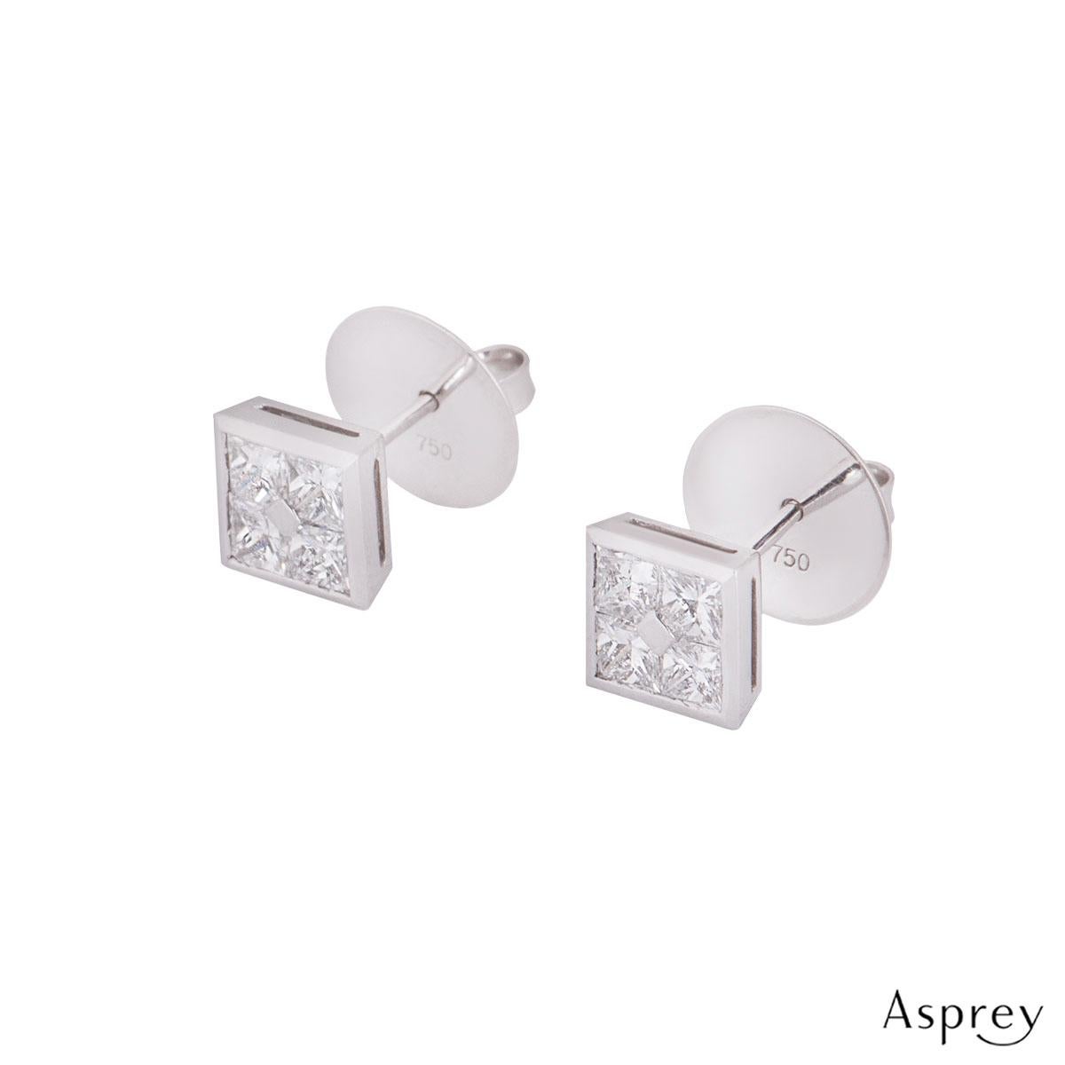 A stunning pair of platinum diamond earrings by Asprey. The earrings are in a square design set with 4 princess cut diamonds in a rub over setting with a total weight of 1.48ct. The earrings feature a post and alpha fitting, measure 0.70cm across