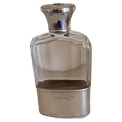 Antique Asprey  silver and gold hip flask, Chester  1912