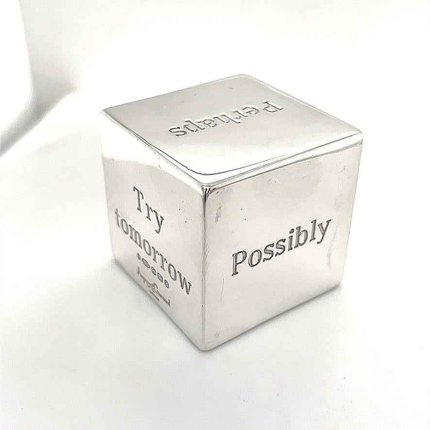 Figural sterling silver desk cube. Made and signed by ASPREY  LONDON. This takes the stress out of making decisions.  Each panel is engraved with a different option:  