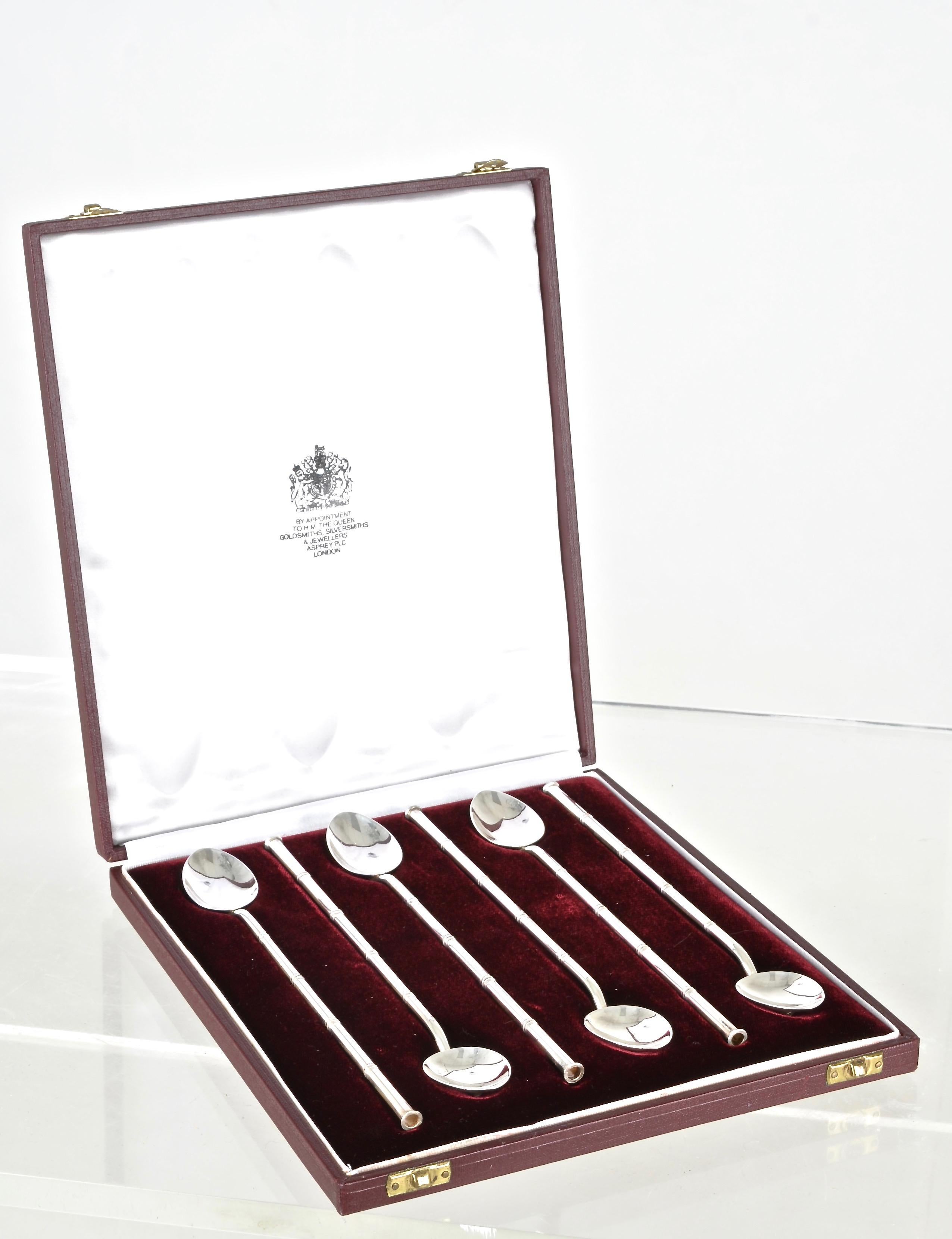 Just beautiful set of sipping stirrers by the revered silversmiths Asprey of London. Classic faux bamboo styling with simple flat spoon. Ultimate replacement for plastic straws! In original custom leather case. Embossed hallmark on each stirrer.