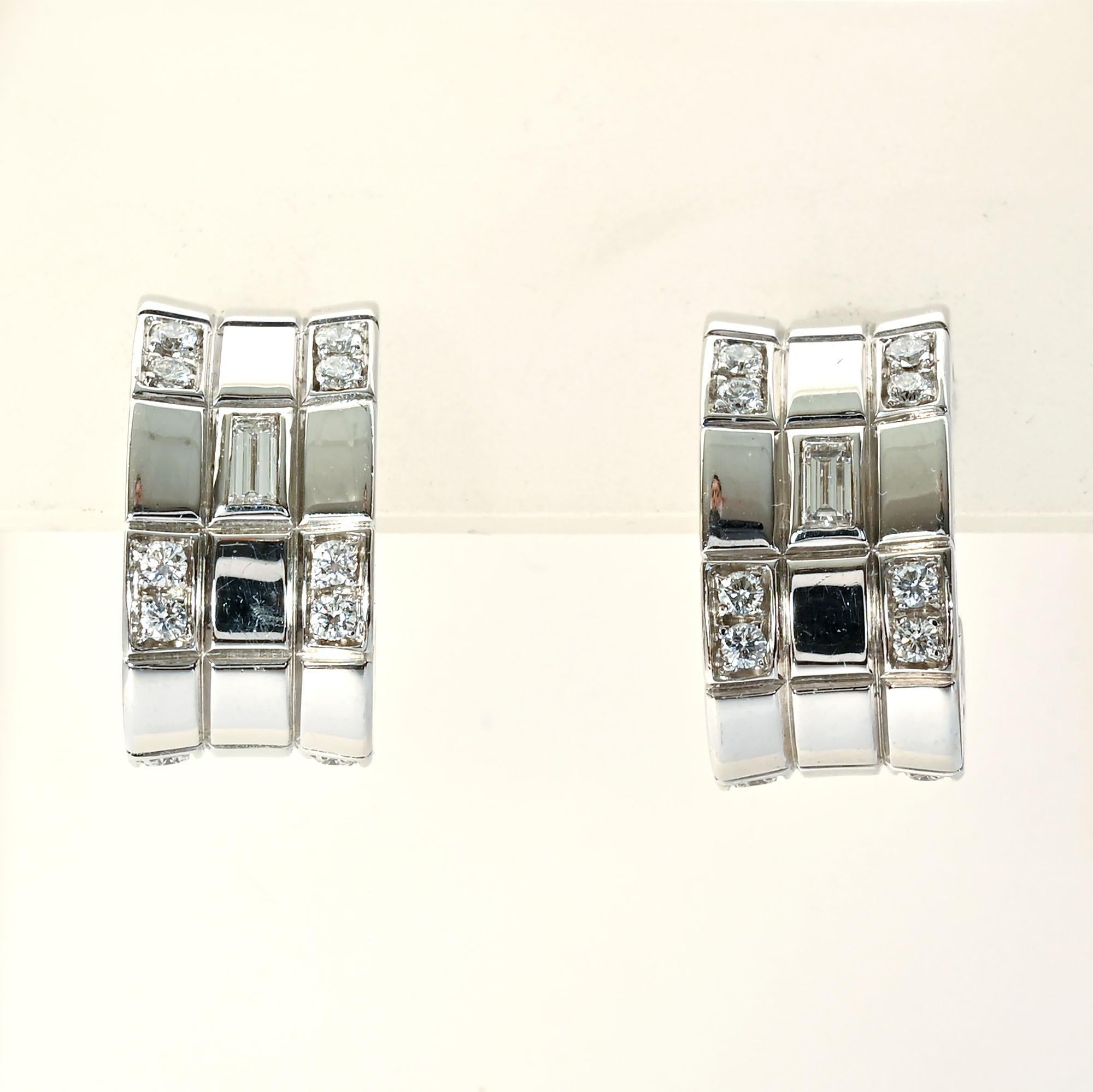 Asprey half hoop earrings done in 18 karat white gold.  They have a total weight  of one carat of diamonds. Rectangles of gold alternate with those of diamonds making for just the right amount of sparkle.  Clip backs can be converted to posts.