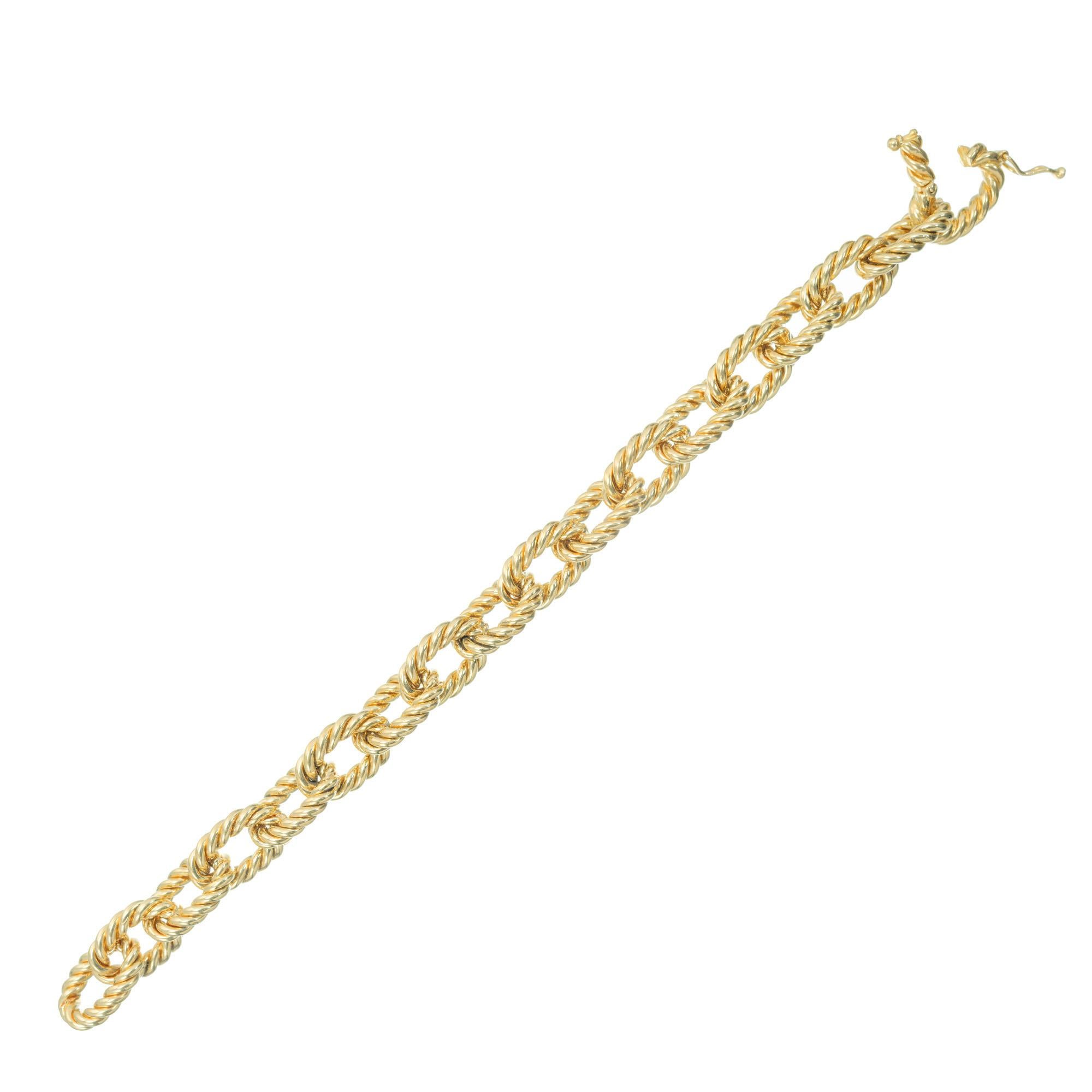 Asprey 8 Inch solid 18k yellow gold twisted link bracelet with built in hidden catch

18k yellow gold 
Stamped: 18k
Hallmark: Asprey 
71.9 grams
Bracelet: 8 Inches
Total length: 8 Inches
Width: 11.45mm
Thickness/depth: 3.3mm
