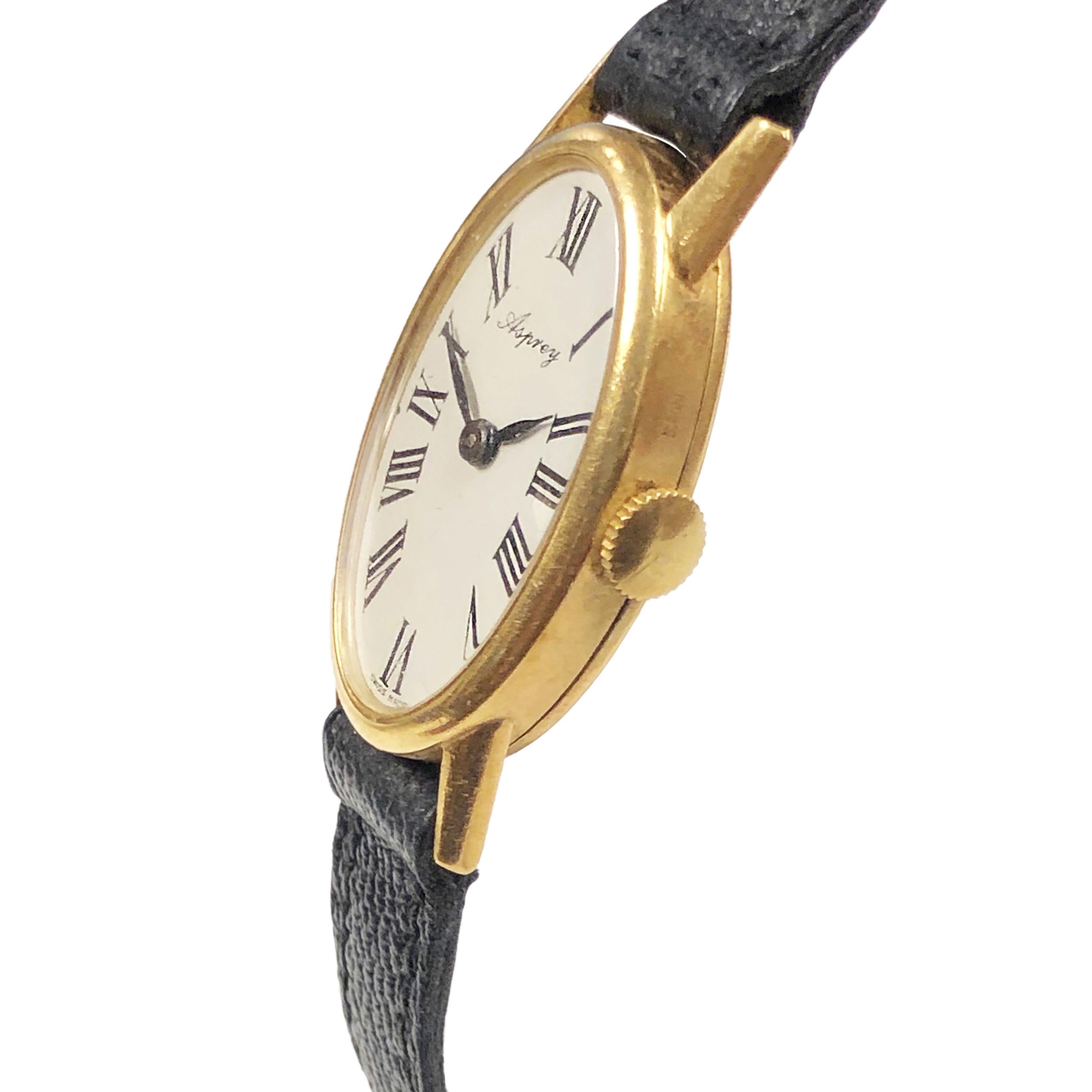 Circa 1960s Asprey Retailed, Baum And Mercier Wrist Watch, owned and worn by Jerry Lewis. 18K Yellow Gold 26.5 X 17 MM Oval 2 Piece case. 17 Jewel Mechanical, manual wind movement. White Dial with Black Roman Numerals. New Black Lizard Strap.  Most