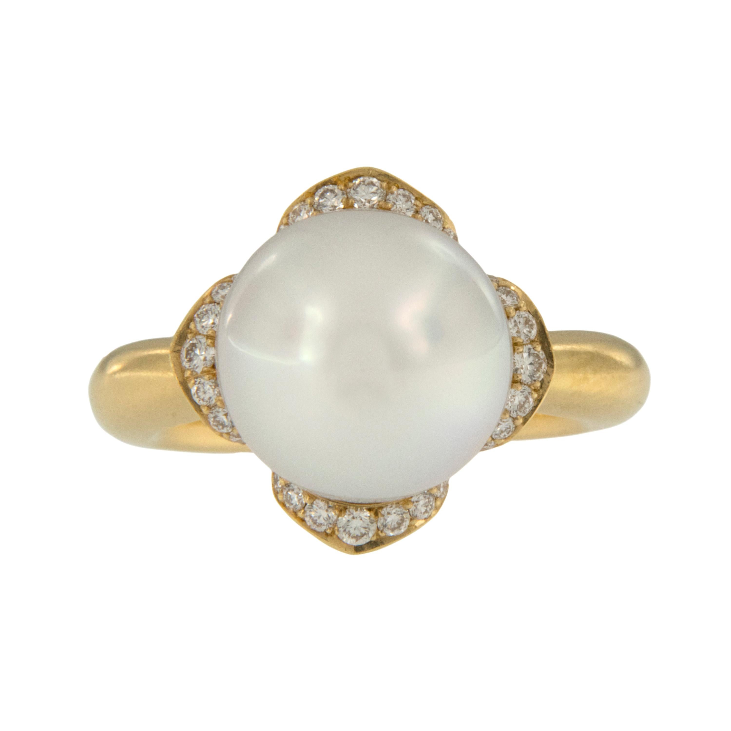 Assael is a name synonymous with the finest pearls of the world. This rare, 20 karat yellow gold flower inspired ring perfectly showcases a fine South Sea cultured pearl (12-11.7mm) which is further accented by 44 diamonds = 0.31 Cttw in a size 6,