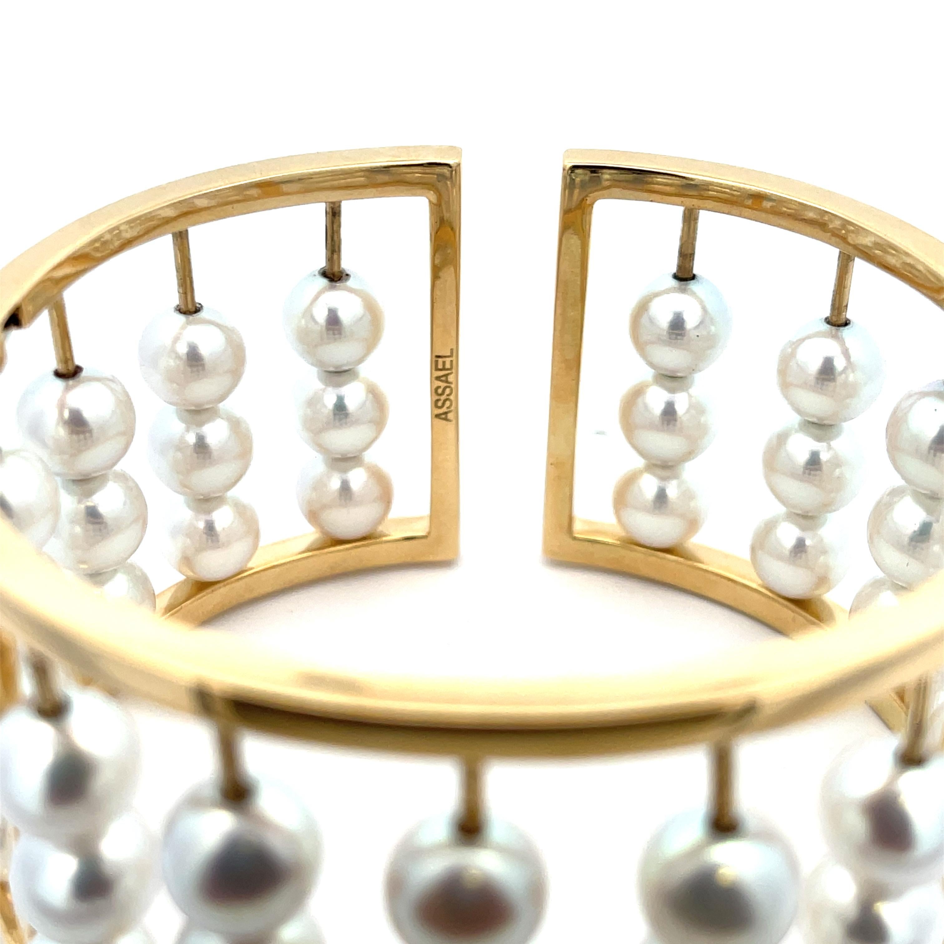 Assael Akoya Cultured Pearl Cuff in 18K Yellow Gold. The cuff features 54 Akoya pearls, 7.5-8mm. The cuff is 1.25