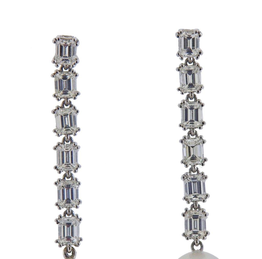 New 18k white gold earrings, by Assael. Set with 2.53ctw of VS/G diamonds, and south sea pearls. Earrings are 47mm long. South Sea pearls - 14mm x 15.2mm. Marked - 750. Weight - 13.7 grams. Retail $19800
