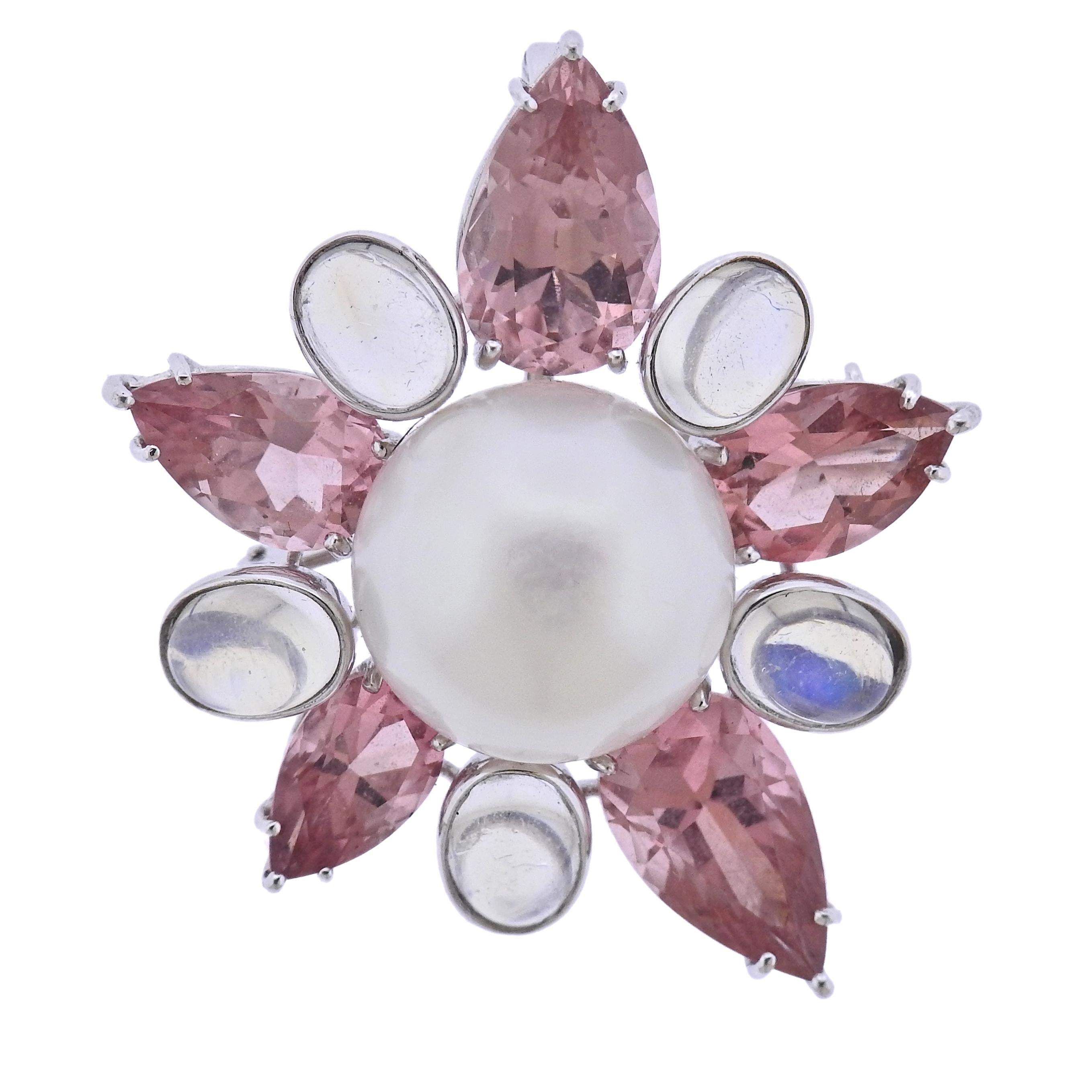 18k white gold Assael for Prince Dimitri pendant brooch, set with a center 17.1mm South Sea pearl, tourmalines and moonstones.  Pendant/brooch is 43mm x 38mm. Weight - 24.4 grams. Marked:  Assael and PD hallmarks, 750. 