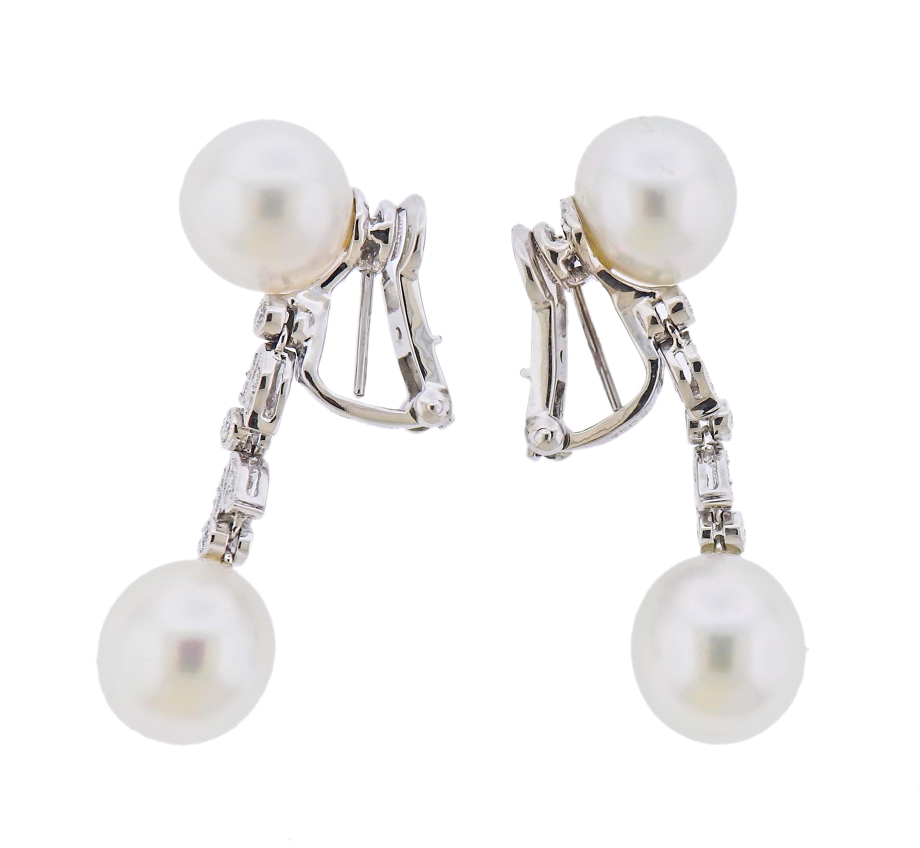 Pair of new Assael 18k gold drop earrings, with approx. 0.34tw in GH/VS diamonds and 11.1mm - 11 x 11.8mm South Sea Pearls. Retail $9500, come with pouch.  Earrings are 42mm long. Weight - 15.5 grams. Marked:  Assael, 750.