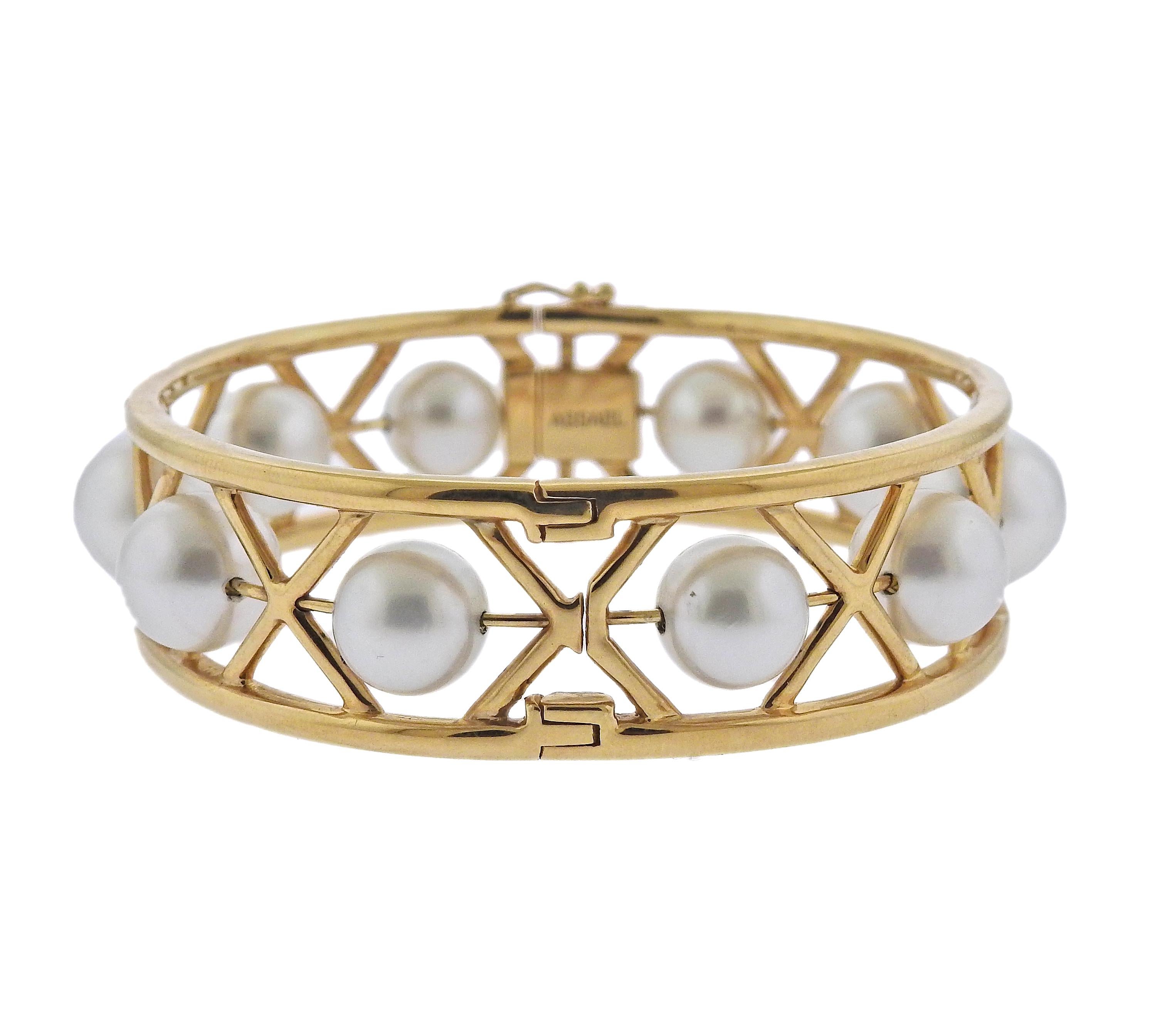 Assael 18k gold bangle bracelet with 10-12mm South Sea pearls. New without tags, retail $18800. Bracelet will fit approx. 7