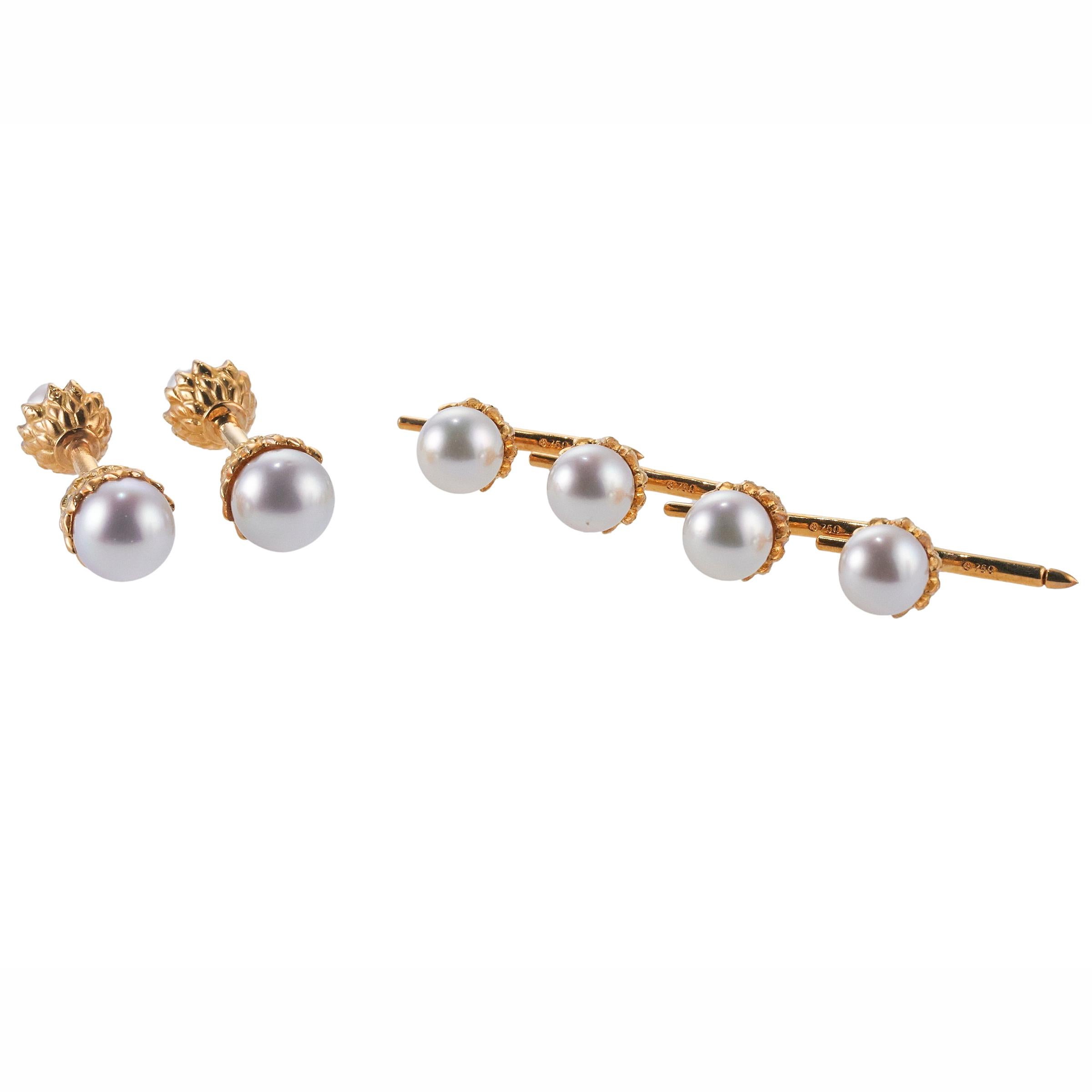 18K yellow gold South Sea Pearl cufflinks and studs set by Assael. Cufflink's top measure 10.5mm and back is 8.7mm; Stud top is 9mm. Marked: 18k, 585 (stud hardware). Weight is 29.3 grams. Retail Value $8000.