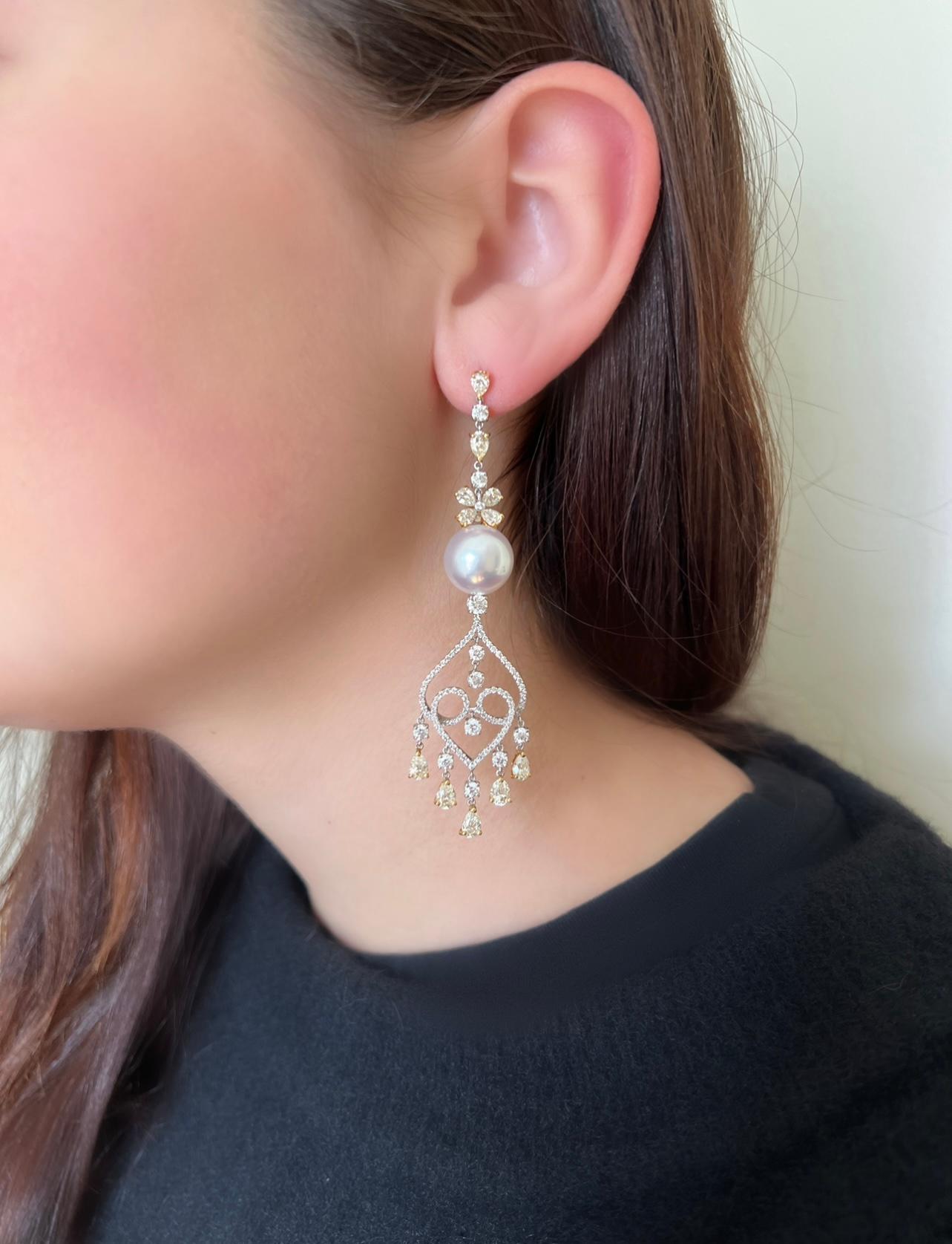 These Assael chandelier earrings are stunning. Featuring two South Sea Fine Pearls, 12.71 mm each. The earrings also contain 7.62 carats of white and yellow diamonds, with G-H color and VS-SI clarity. The diamonds and pearls are set in 20.31 grams