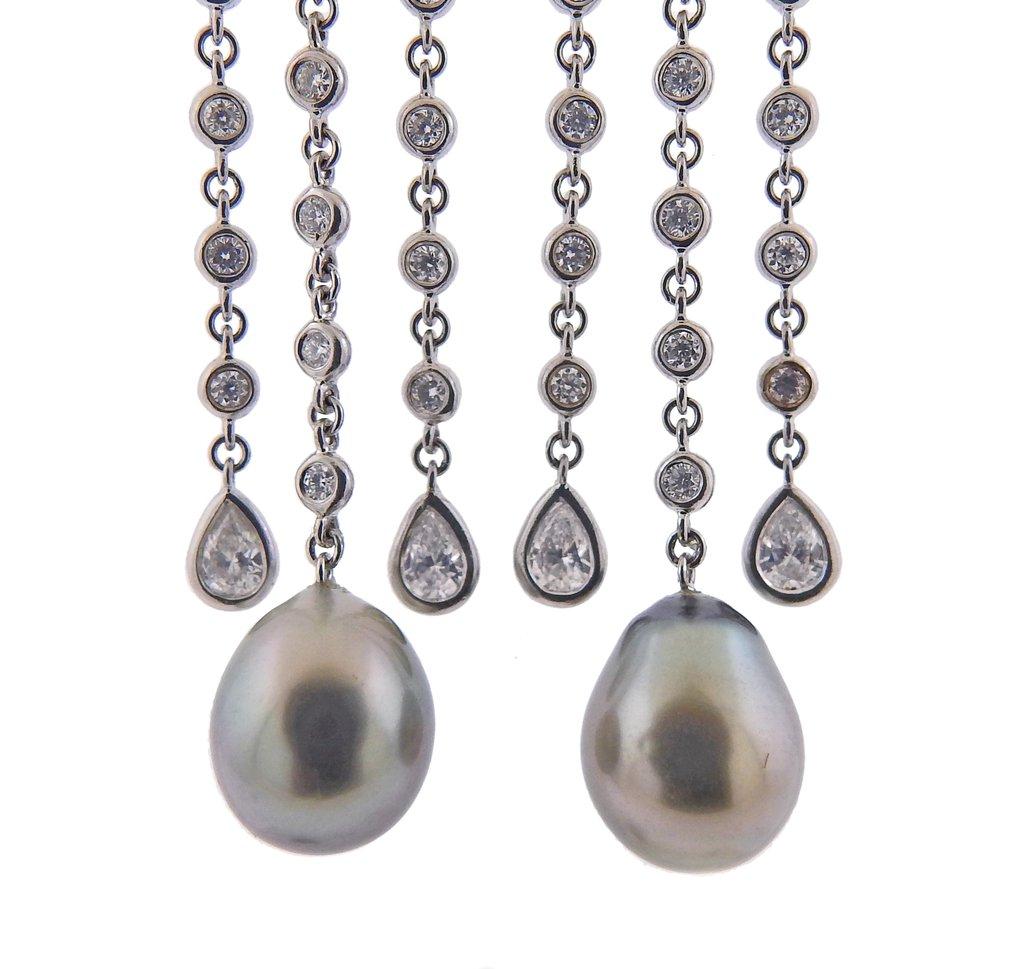 New 18k white gold earrings, by Assael. Set with 3.46ctw of VS/G diamonds, and south sea pearls. Earrings are 62mm long, South Sea Tahitian pearls - 13.5 x 10mm. Marked - 750. Weight - 15.5 grams. Retail $20800.
