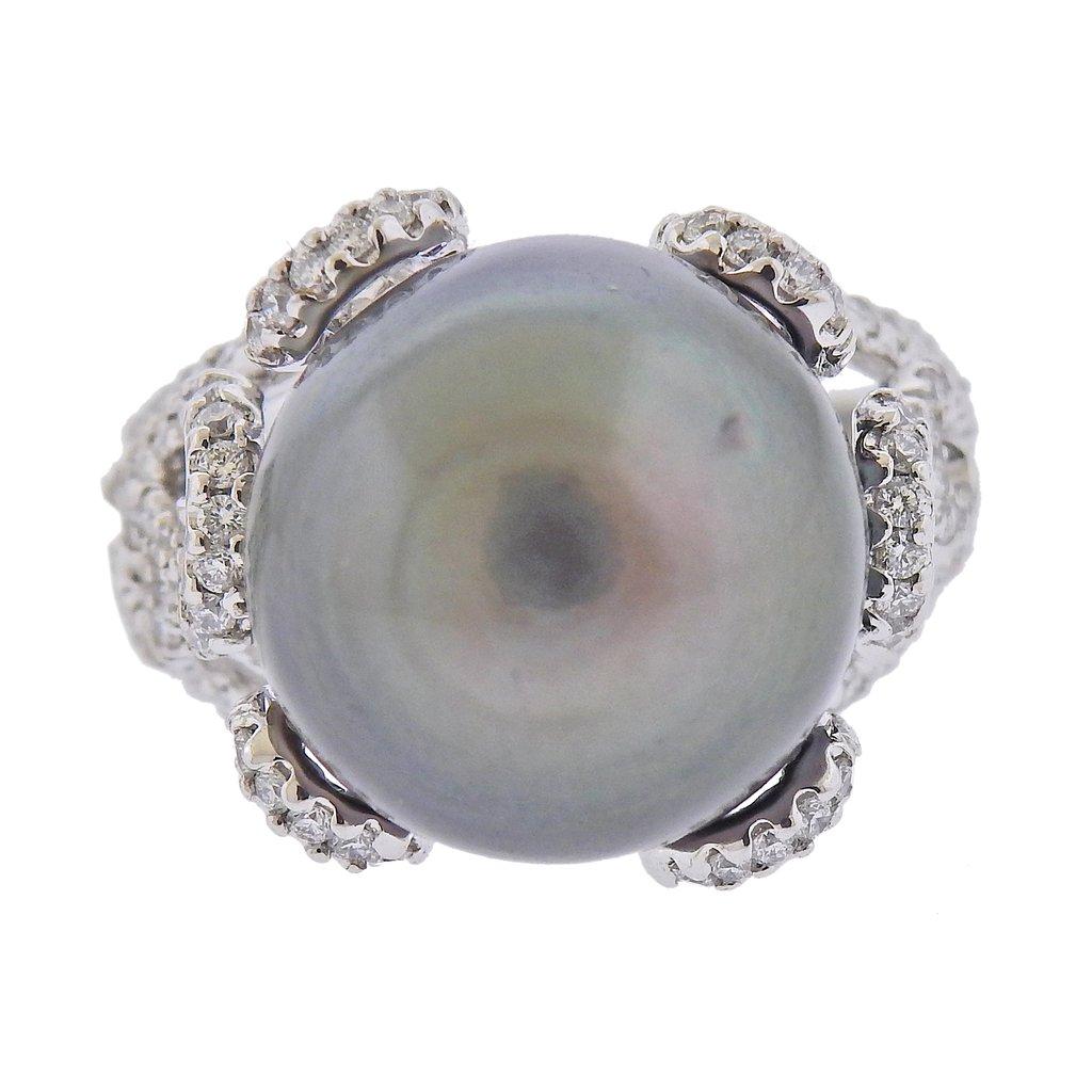 New 18k white gold cocktail ring , by Assael. Set with 1.19ctw of diamonds, and south sea pearls. Ring size - 7, South Sea Tahitian pearl - 15.1mm. Marked - 750, makers mark. Weight- 8.8 grams. Retail $7800.
