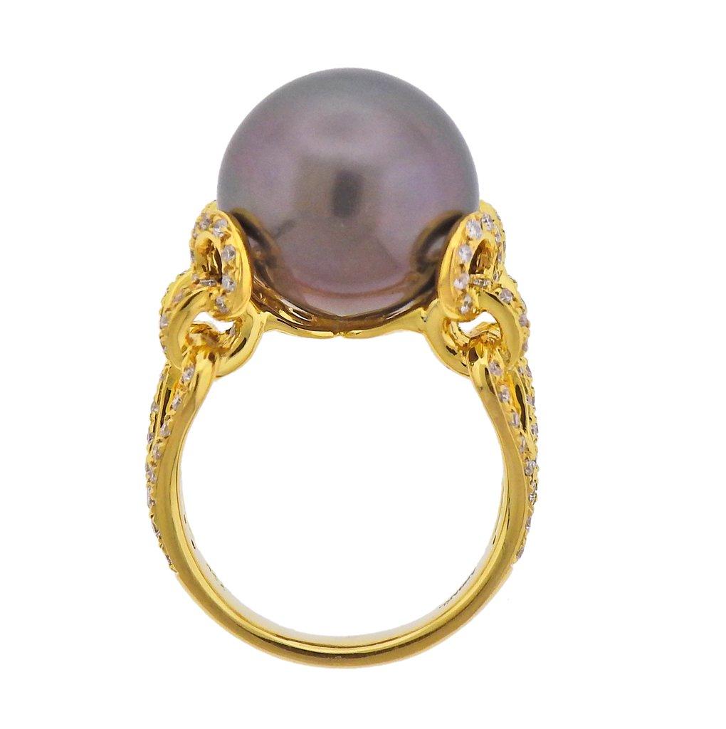 New 18k yellow gold ring, by Assael. Set with approx 0.78ctw of VS/G diamonds,  and south sea Tahitian pearl.  Ring size - 7.25, South Sea Tahitian pearl - 14.6mm. Marked - 750, Assael. Weight - 12.6 grams. Retail $6900.
