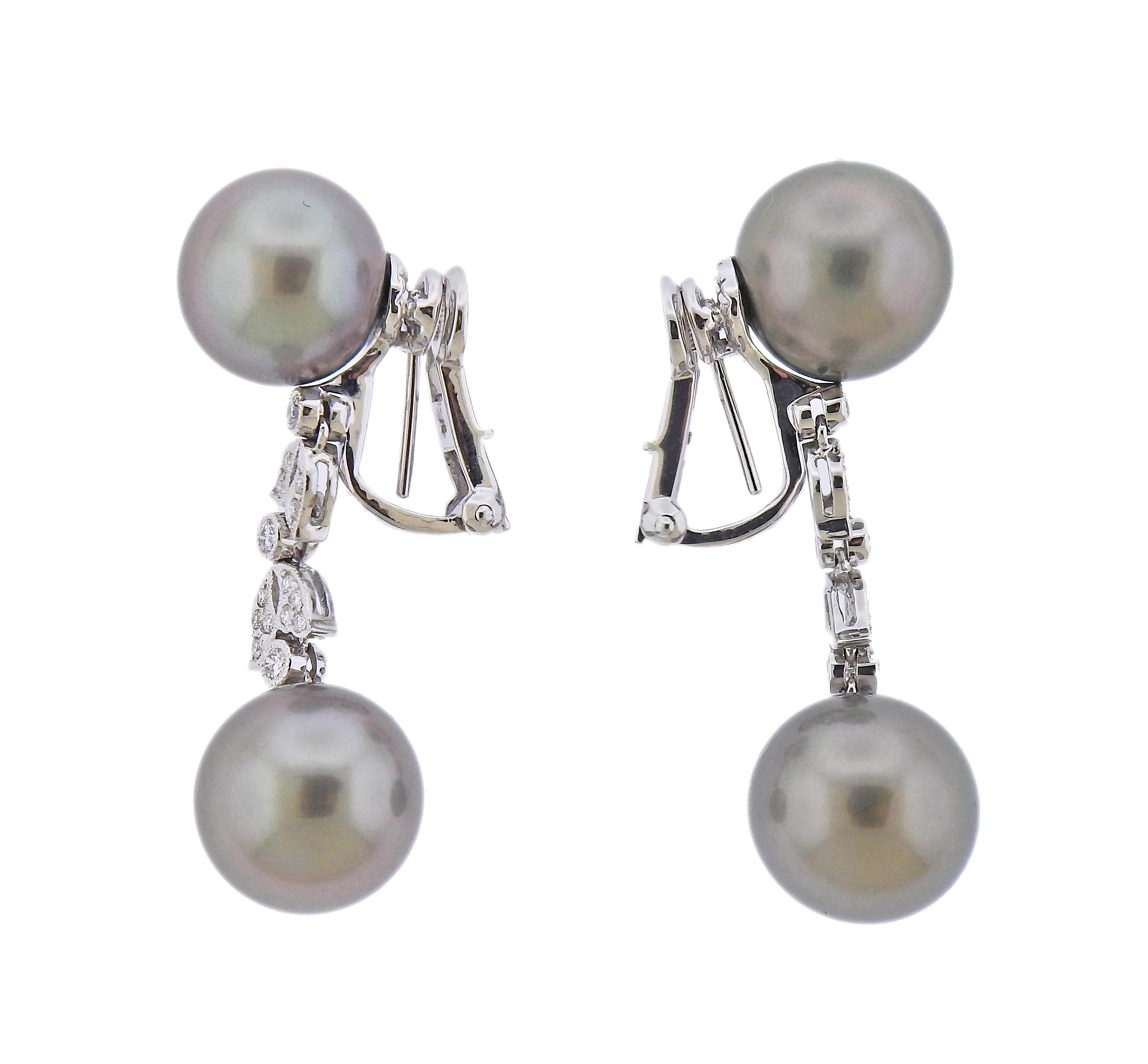 18k white gold South Sea Pearl drop earrings by Assael, set with approx 0.33ctw of VS G diamonds. Brand new without tags, comes with Assael pouch. Retail - $9500.  Earrings are 43mm long. Pearls measure 12.2-12.6mm.  Marked: 750. weight - 17.8
