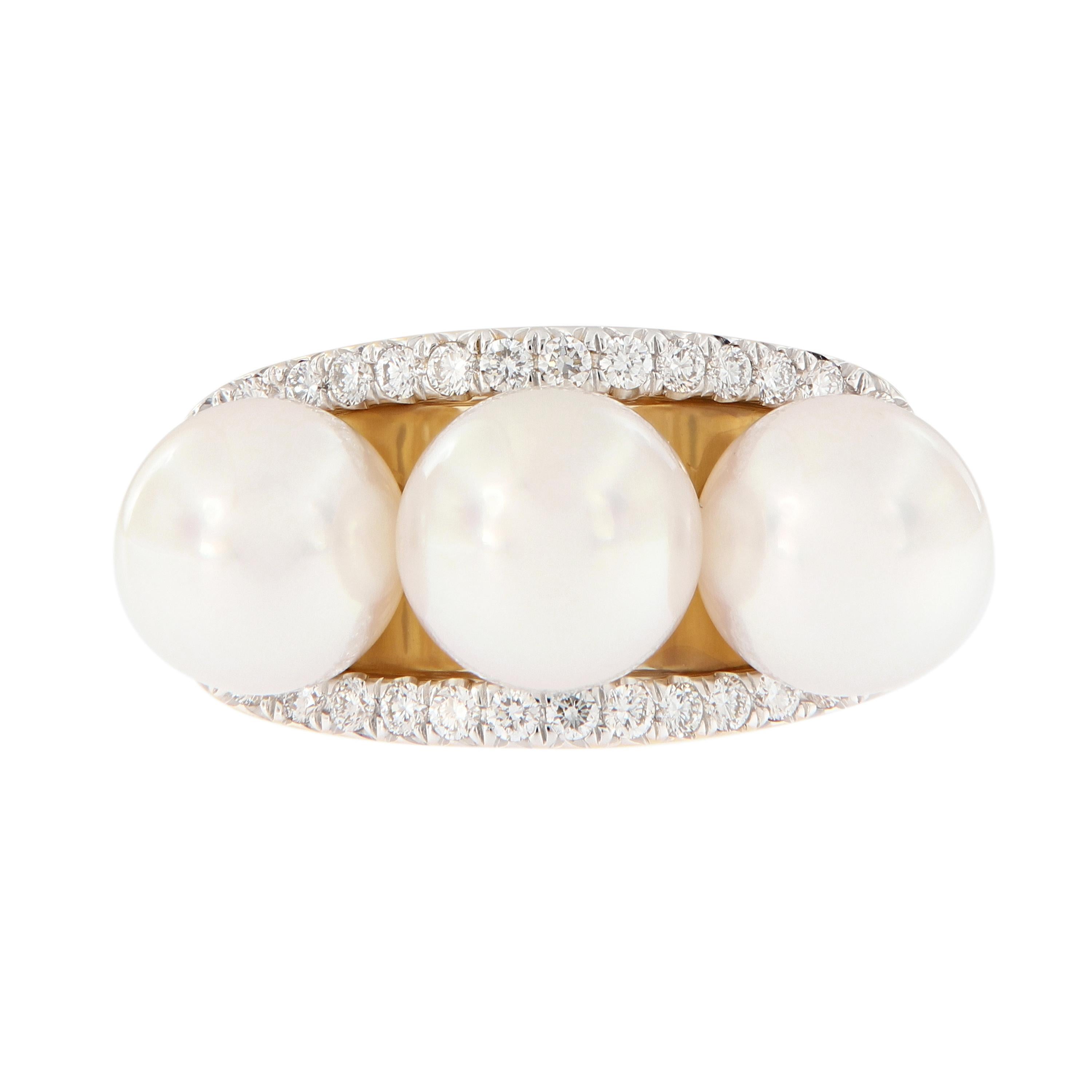A trio of Akoya cultured pearls, accented with diamonds set in 18k yellow gold. From Assael of New York. Weighs 12.4 grams. Ring Size 6.75.
Marked Assael.

Pearls 8-8.5mm.
Diamonds 0.45 cttw.