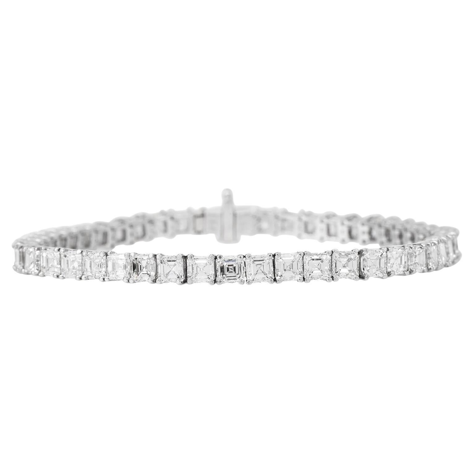 Platinum Asscher Cut Diamond Tennis Bracelet

This stunning platinum tennis bracelet features 47 Asscher-cut diamonds, each 0.30 carat totaling approximately 14.00 carats.

Known for their distinctive square shape and mesmerizing 'hall of mirrors'