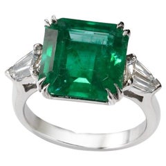 Asscher-Cut 5.50 Carat Emerald & Diamond Three-Stone Ring