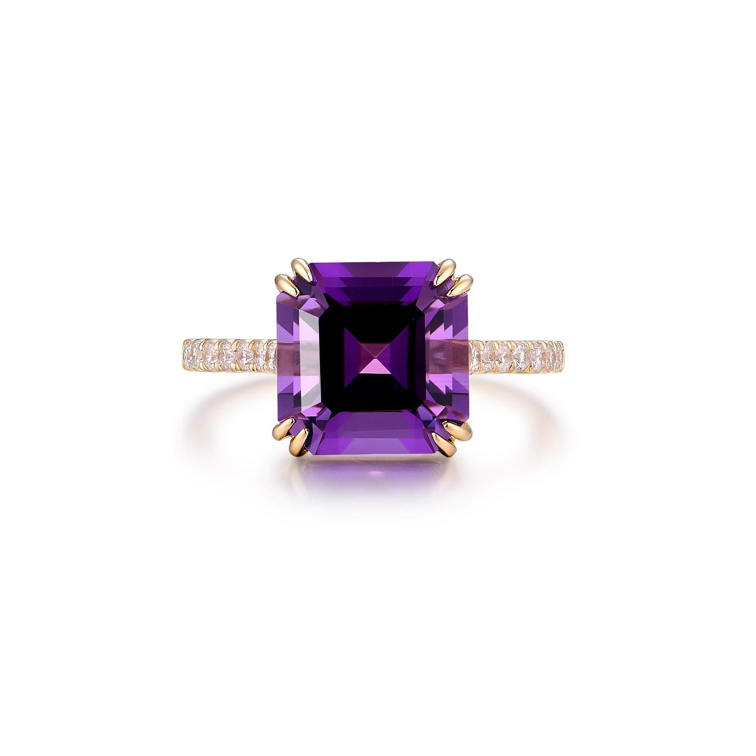 The Asscher Cut Amethyst Diamond Ring is a breathtaking embodiment of opulence and artistry. Set in the timeless expanse of 14K Yellow Gold, this exquisite piece is centered around a stunning 4.49ct Asscher cut amethyst. The deep purple hue of the
