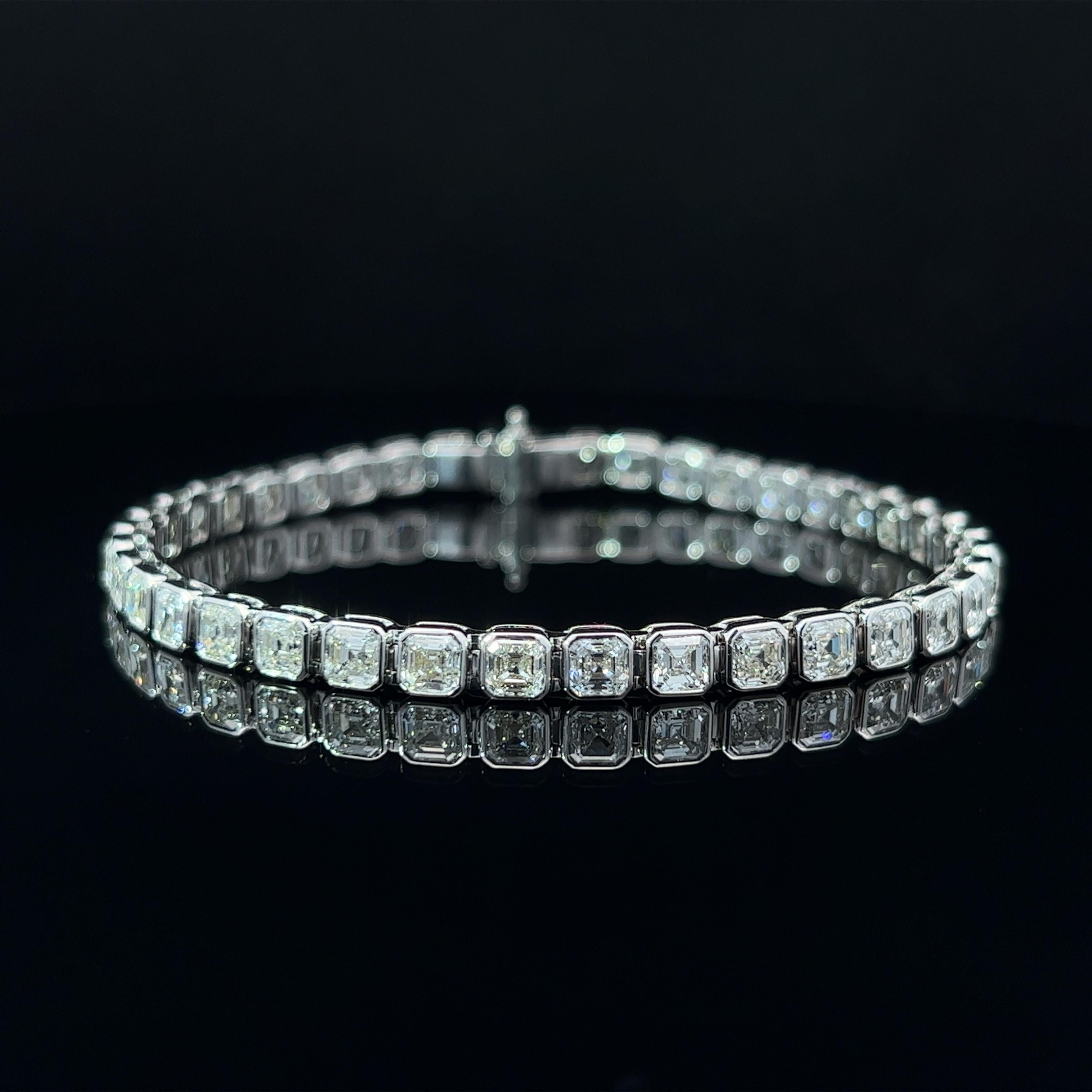 Key Features:

Diamond Shape: Asscher (Square Emerald)
Total Diamond Weight: 9.34ct 
Individual Diamond Weight: .25ct
Color/Clarity: FG VVS
Metal: 18K White Gold
Metal Weight: 14.33g

Asscher-Cut Diamond: The centerpiece of this bracelet is a