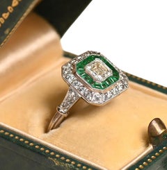 GIA Diamond And Emerald Ring. 0.50ct Diamond Emerald Halo Engagement Ring H VS1