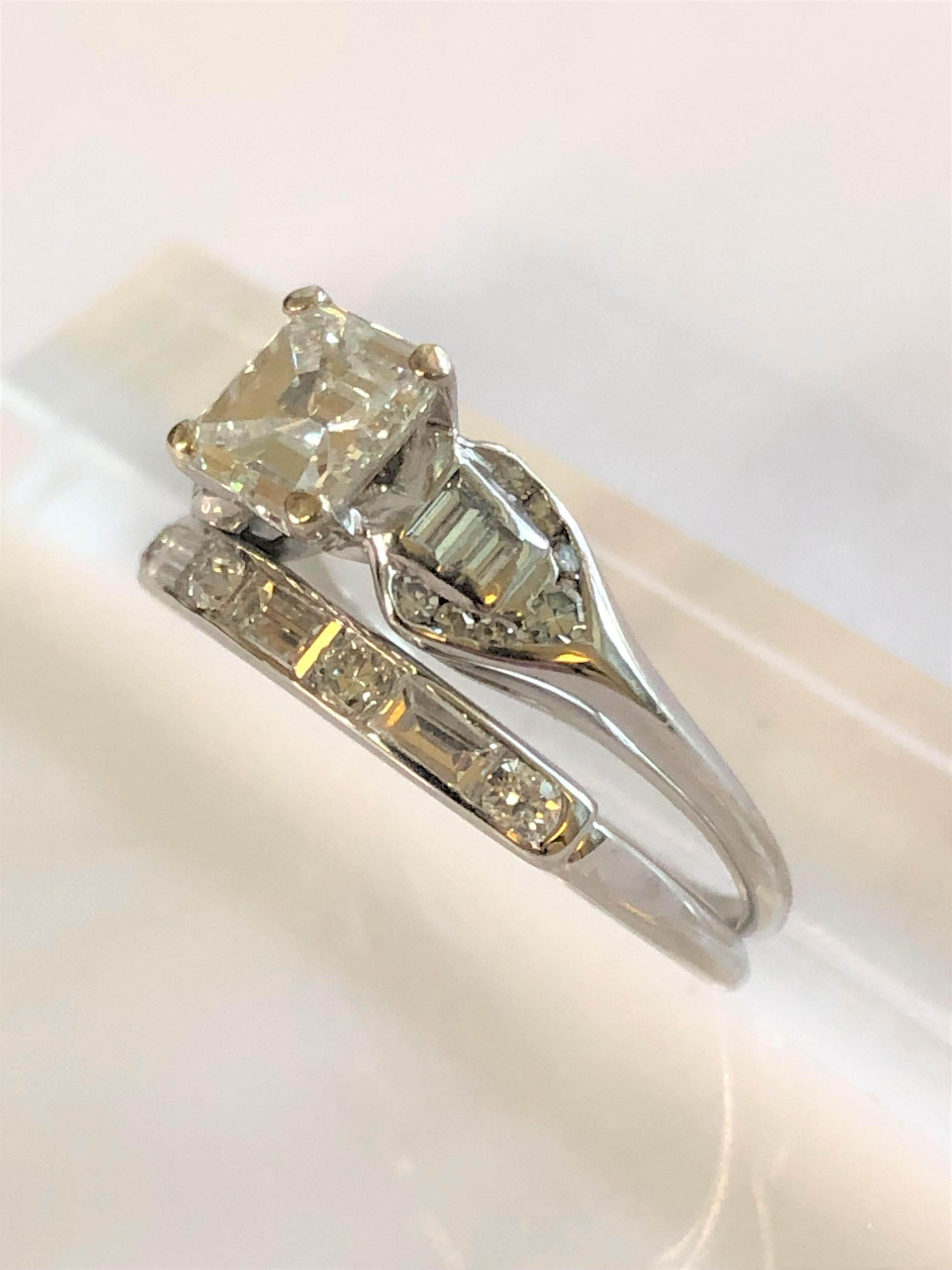 This engagement ring and wedding band are beautiful and have has lots of detail and sparkle!
Engagement ring and wedding band are soldered together; can be separated, if desired.
Engagement Ring, approximately 2.12 total diamond weight.
    