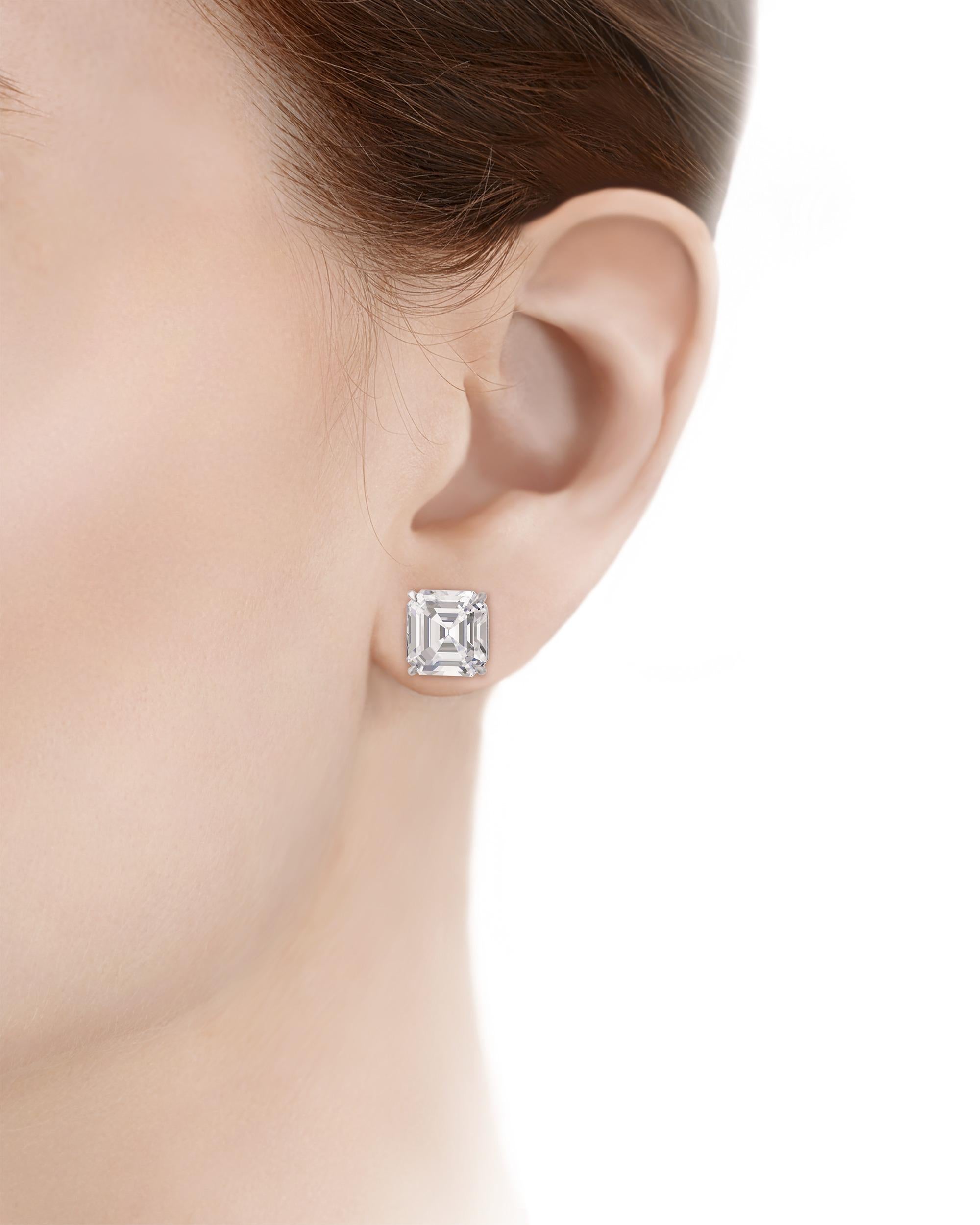 Remarkably reflective and brilliant, these classic diamond studs feature two Asscher-cut diamonds weighing a combined 14.42 carats. Each gem is certified by the Gemological Institute of America as displaying G color and VS1-VVS1 clarity.