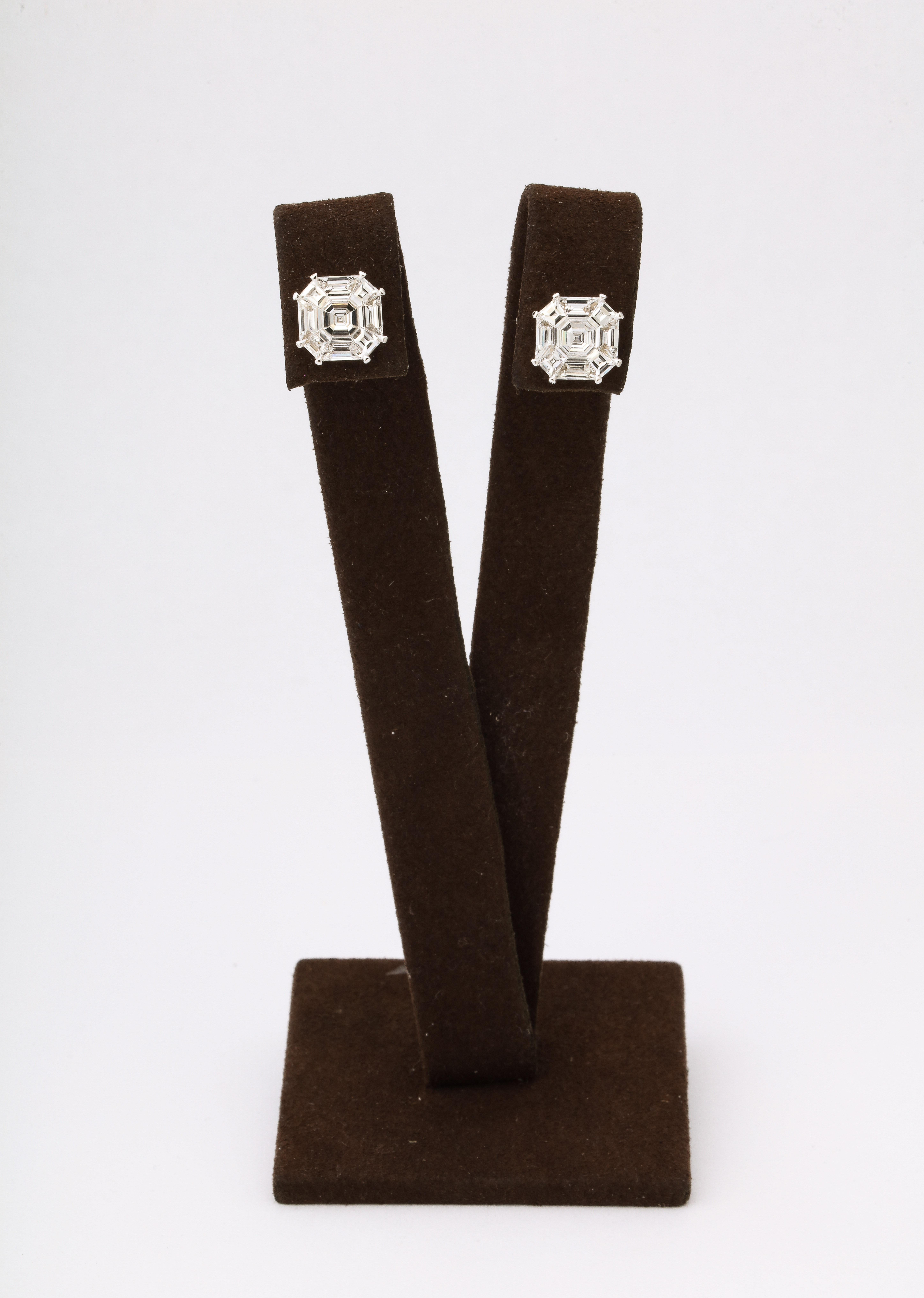 
A FABULOUS pair of stud earrings! 

Each stud has the measurements of an over 5 carat Asscher cut diamond! 

3.16 carats of F color VS special cut diamonds illusion set in 18k white gold. 

Approximately 10.08 mm x 10.08 mm. 
