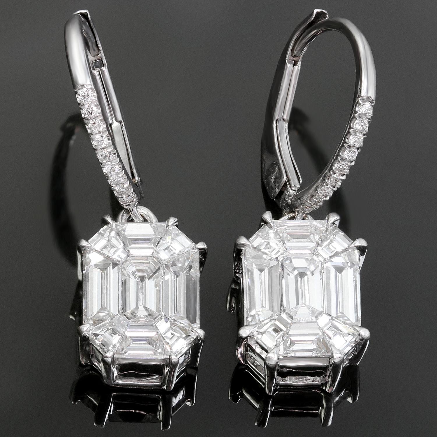 These exquisite modern drop earrings are crafted in 18k white gold and feature tapered baguette and emerald-cut G-H VVS2-VS1 diamonds weighting an estimated 2.50 carats and designed to create an illusion of 3.5 carat single large  emerald cut