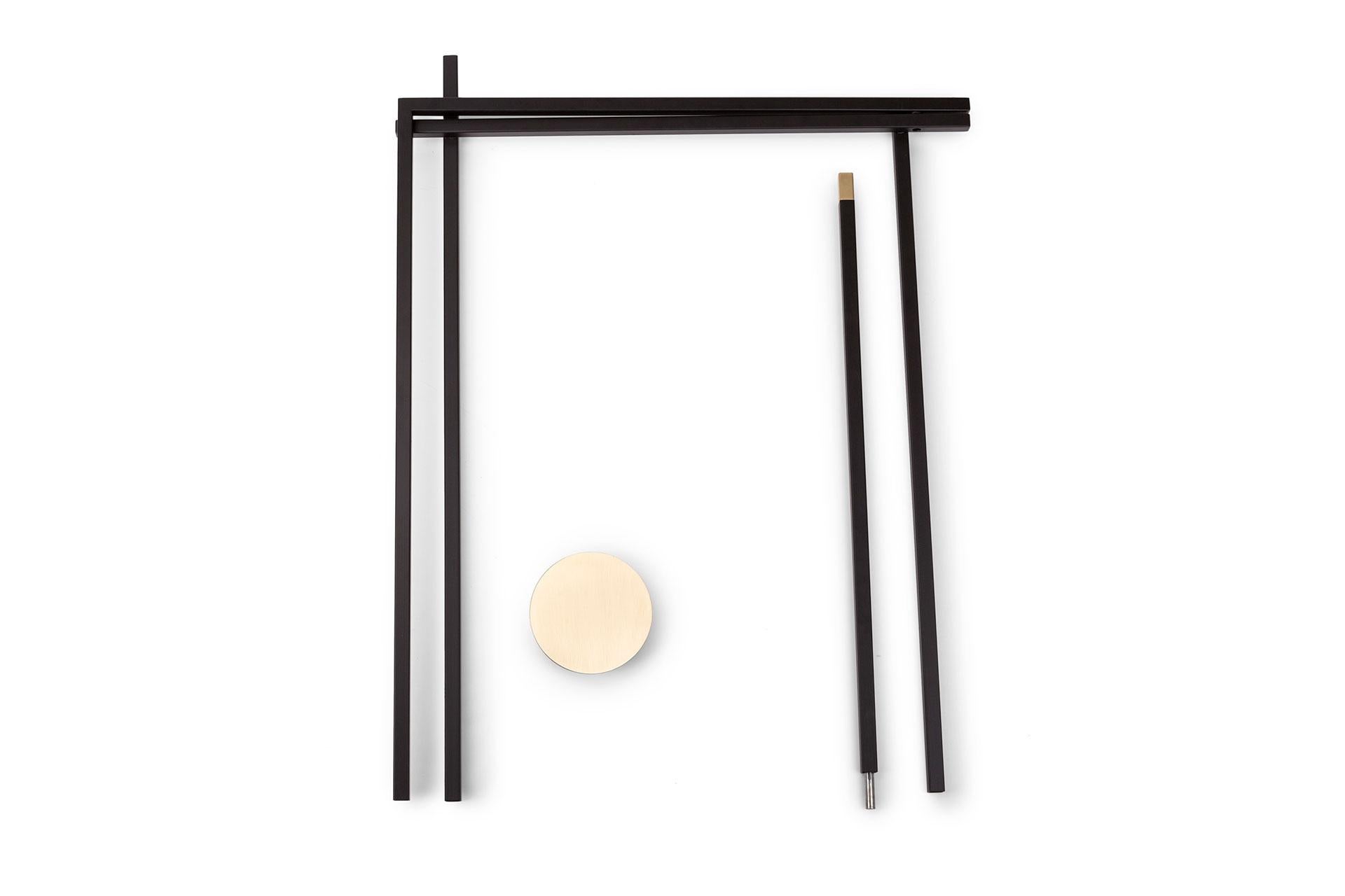 Asse Zeta clothes stand by Mingardo.
Dimensions: D170 x W77 x H100 cm.
Materials: Ral 9005 black varnished iron structure and satin natural brass details.
Weight: 8 kg
Also Available in different finishes. 

Segments mark systems from a point