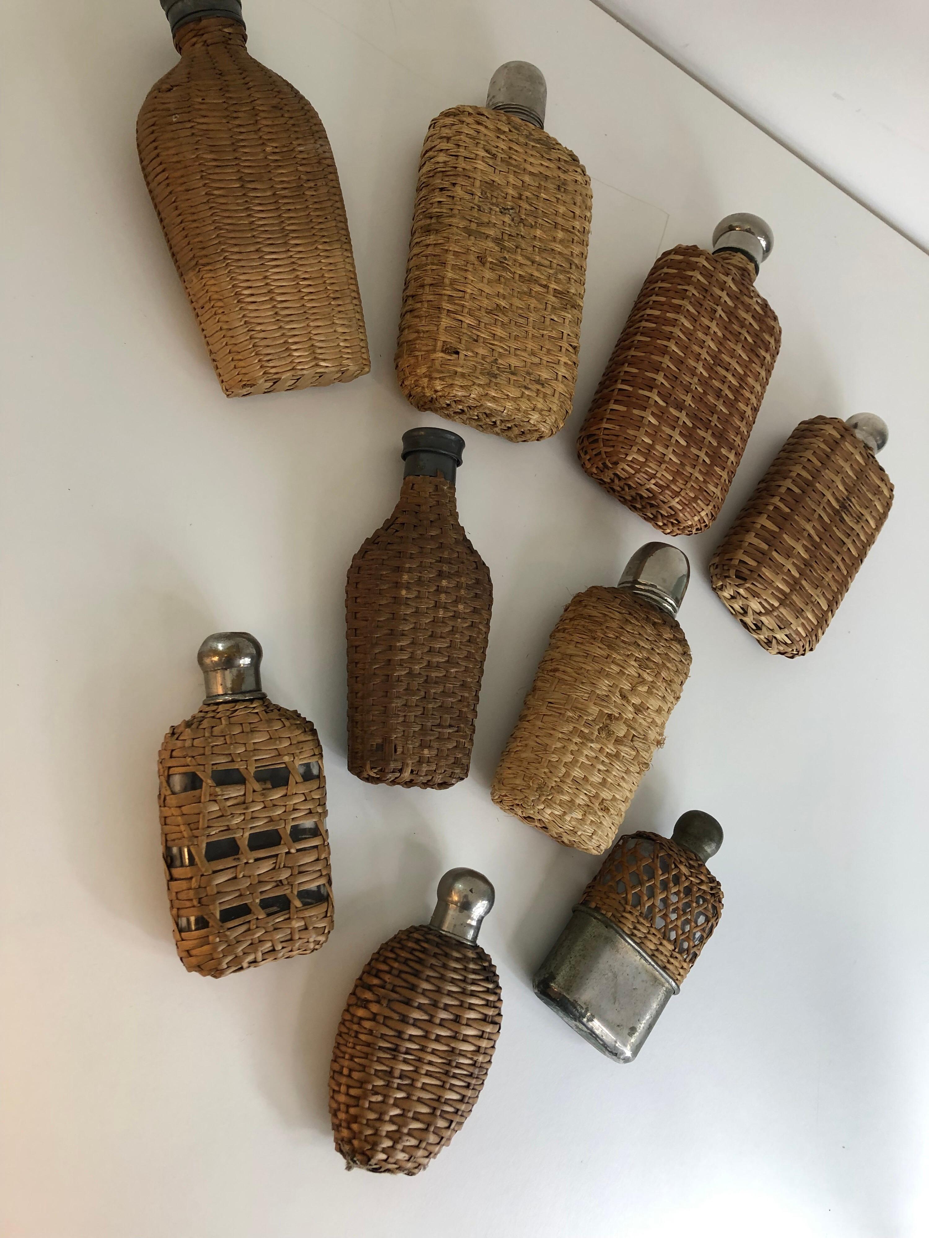 Unknown Assembled Collection of Nine Vintage Wicker Flasks