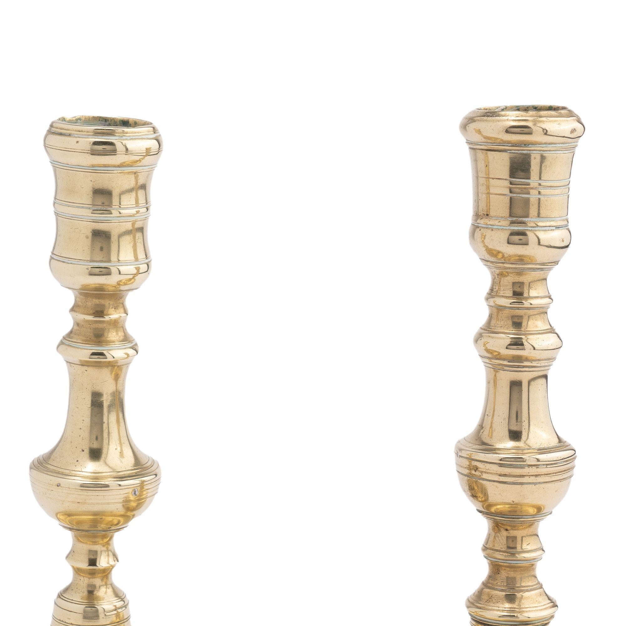 Assembled pair of French cast brass chamber candlesticks, 1710-20 In Good Condition For Sale In Kenilworth, IL
