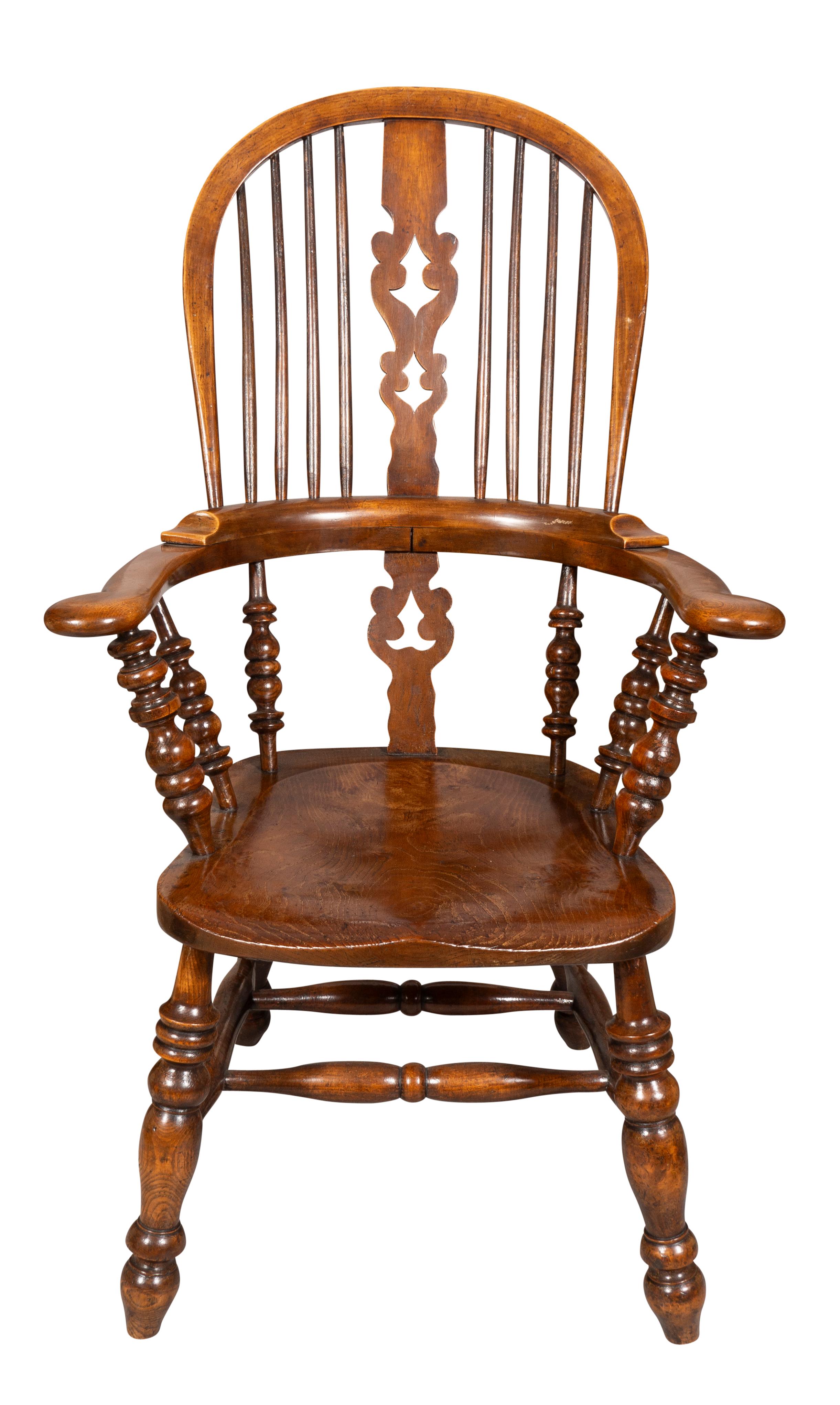 Each with arched backs with splats with tree design cutout flanking spindles , saddle seat and arms with scrolled out terminals, turned legs with turned stretchers. With cushions that are used with some stains.