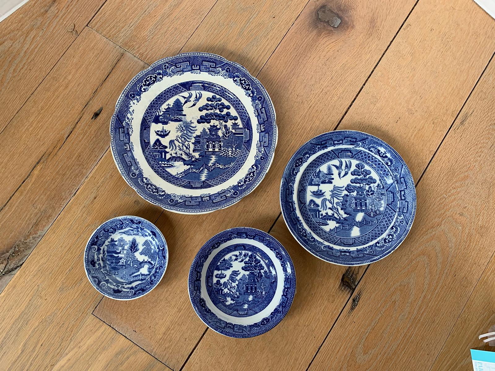Assembled set of four 19th century English blue willow round porcelain plates. Three are marked.
Largest: Wedgwood stoneware, 10