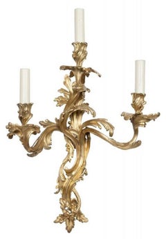 Assembled Set of Four Louis XV Style Gilt Bronze Three-Light Wall Lights