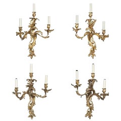 Antique Assembled Set of Four Louis XV Style Gilt Bronze Three-Light Wall Lights