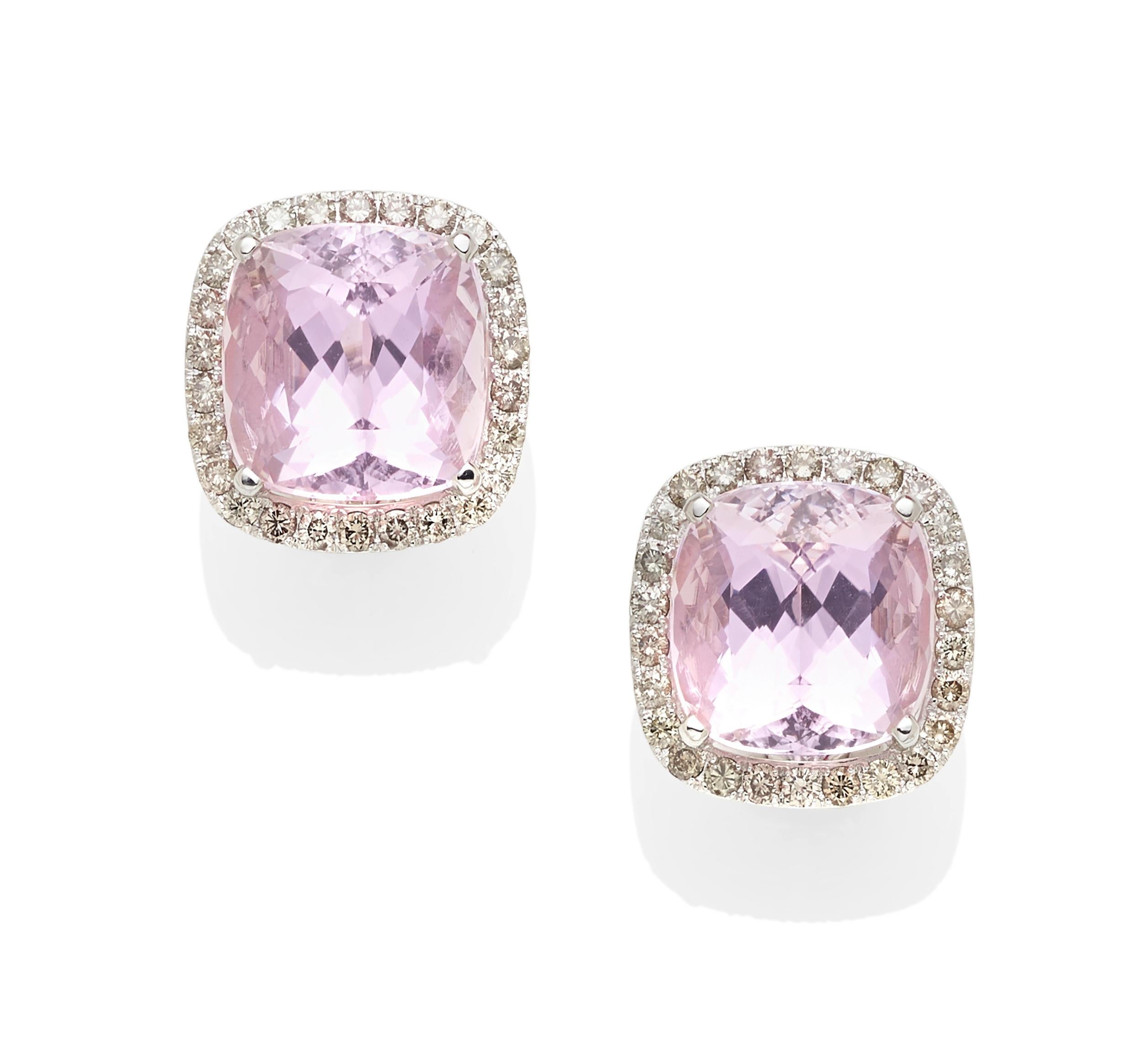 Gorgeous 18k white gold kunzite and diamond earrings.
Features diamonds on the bezel and sides.
Earrings are in excellent condition.

Kunzite: 18.5 x 18.5 mm.
Total Diamond Weight: 5.25 carat.
Metal: 18k white gold.
Weight: 38.5 grams.

Reference