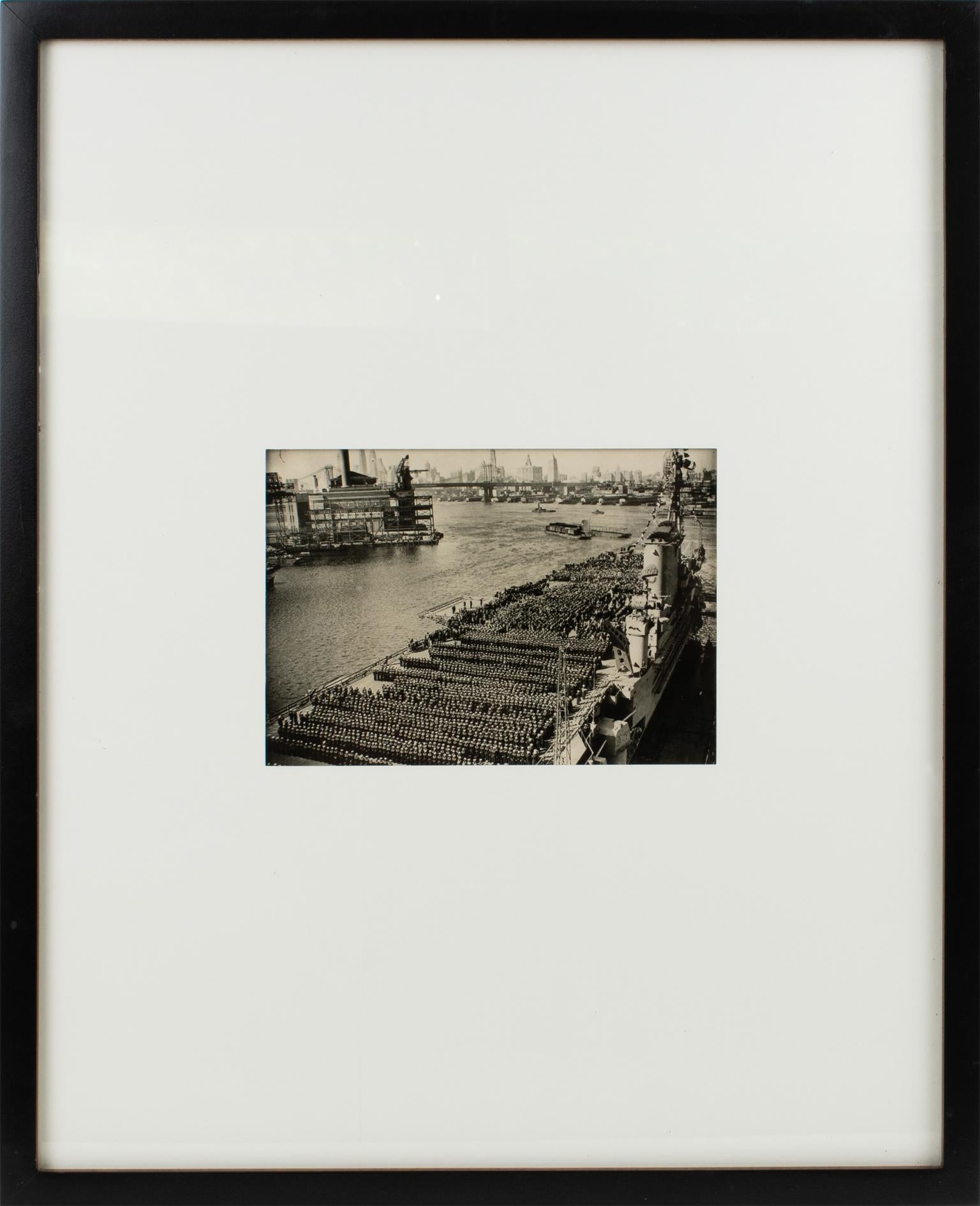 An original silver gelatin black and white photograph by Associated Press Photo. The USS Roosevelt aircraft carriers on the Hudson River, New York, during Navy Day in 1945.
Features:
Original Silver Gelatin Print Photography framed.
Press
