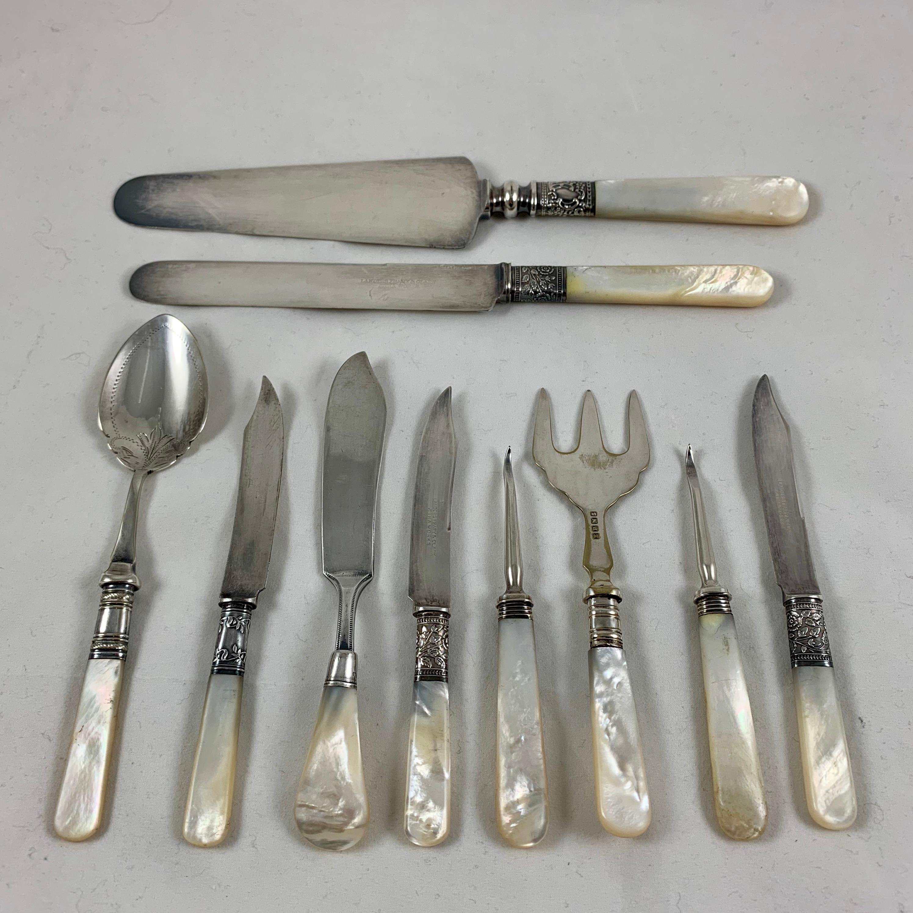 A lovely assortment of mother of pearl handled and sterling silver with EPNS silver plate servers, circa 1880-1910. The English pieces are Sheffield.

Included are:

2) English nut picks: 4.75 in. L x .50 in. W x .25 in. H

1) American pie